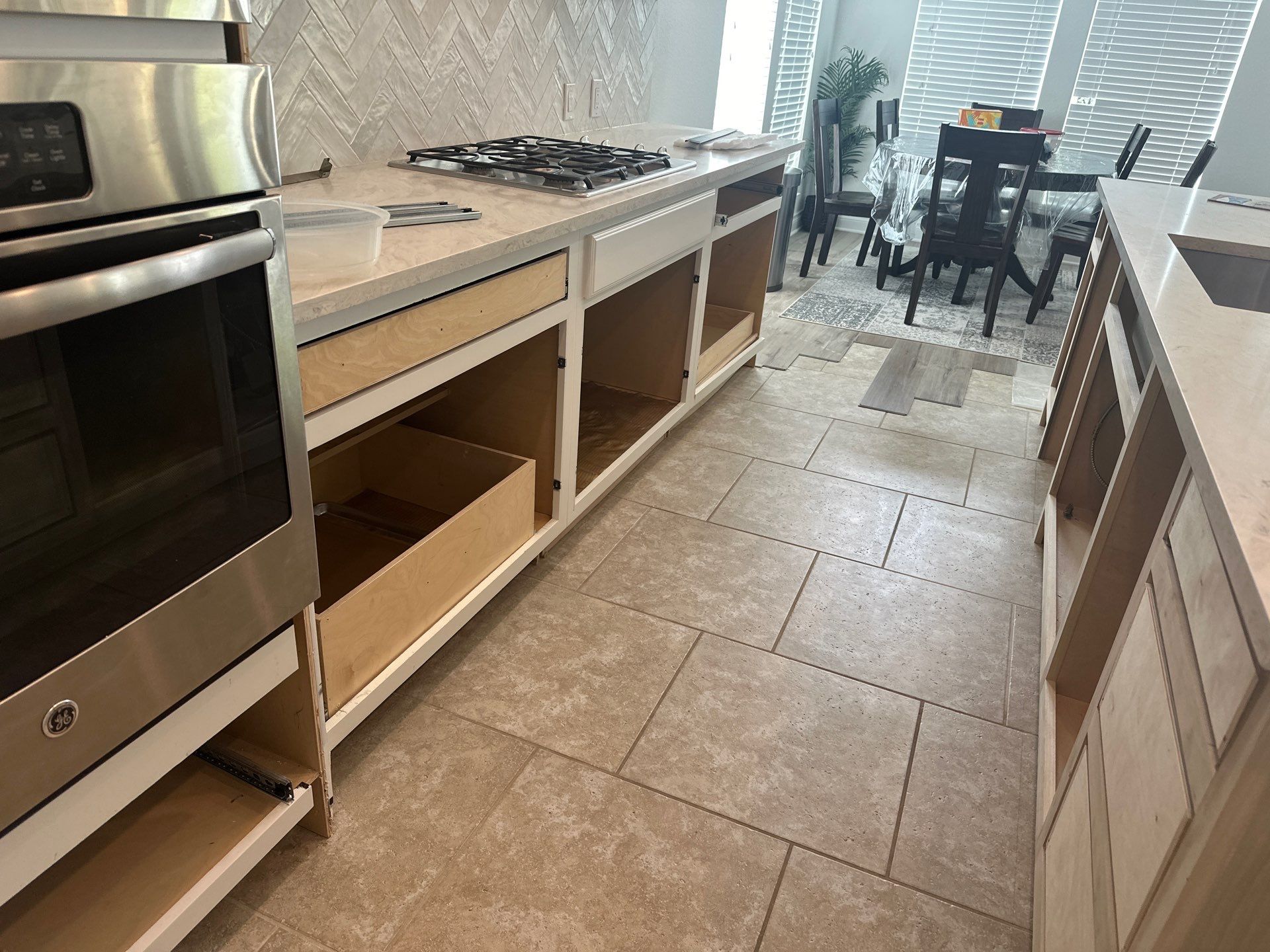 Kitchen Remodel using Water mitigation equipment by L&T General Contractors and Restoration INC