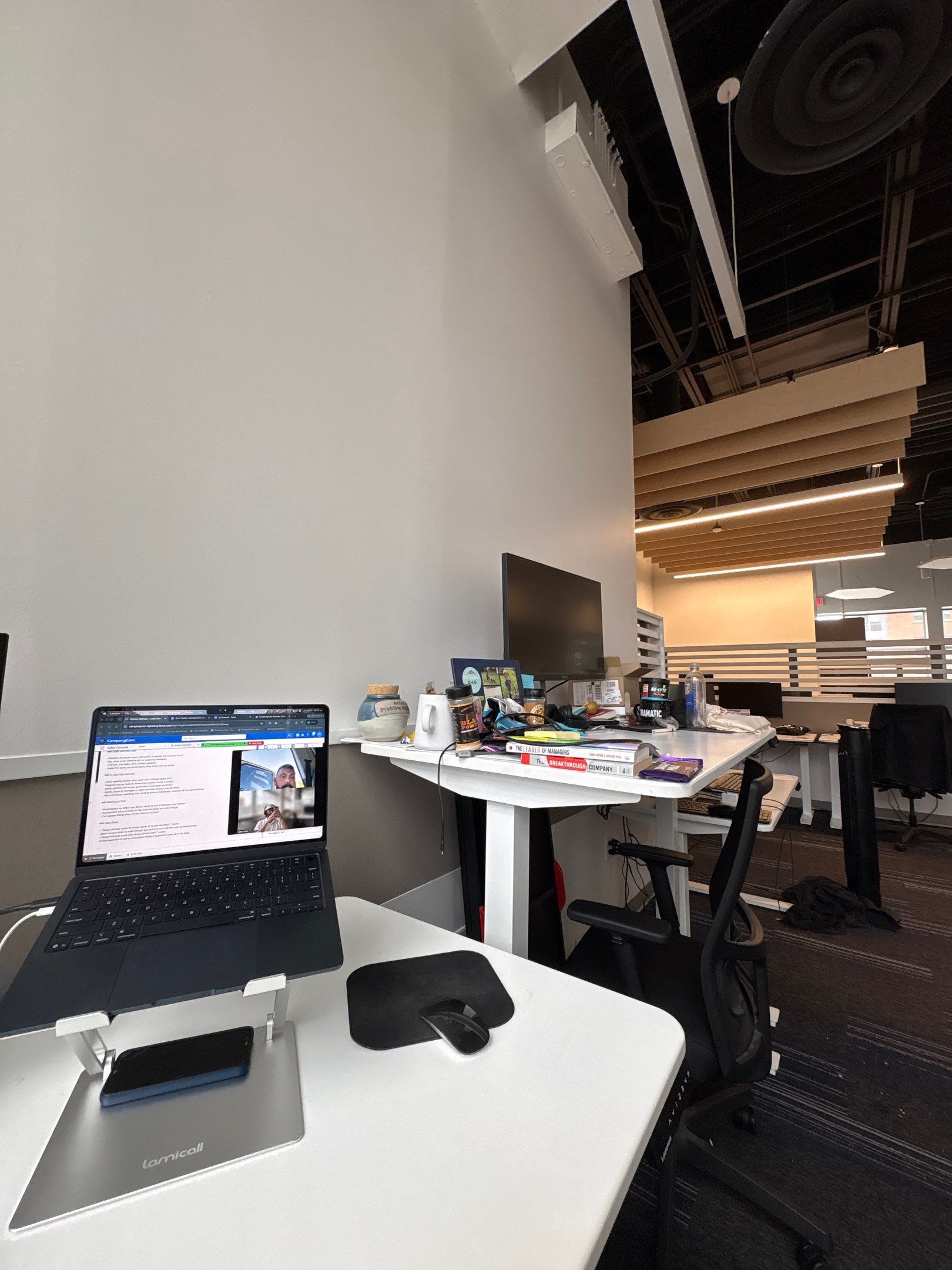 Modern Open-Plan Office Remodel with Acoustic Ceiling Baffles by CompanyCam Sales Demo
