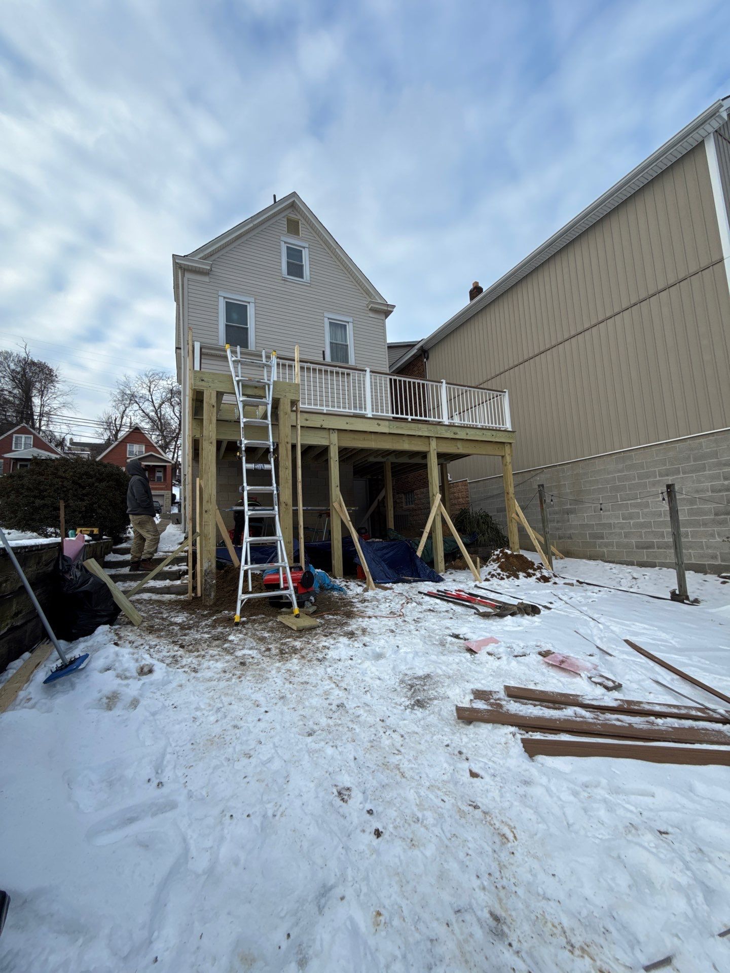 Deck and door by Cousins Roofing Siding & Decks