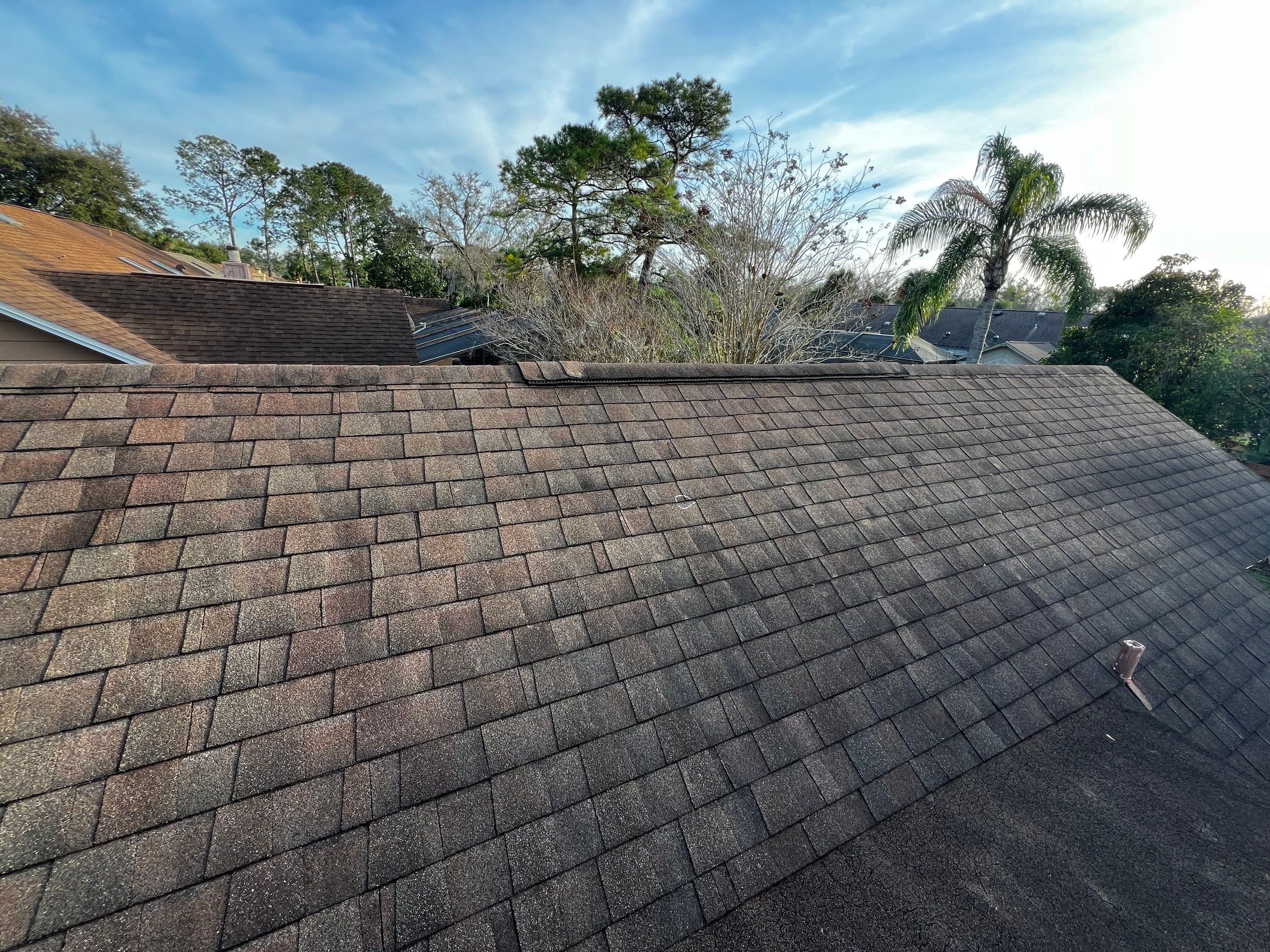 Asphalt Architectural Shingle Roof Replacement and Solar Integration in Longwood by Fortified Roofing Solutions Corp.