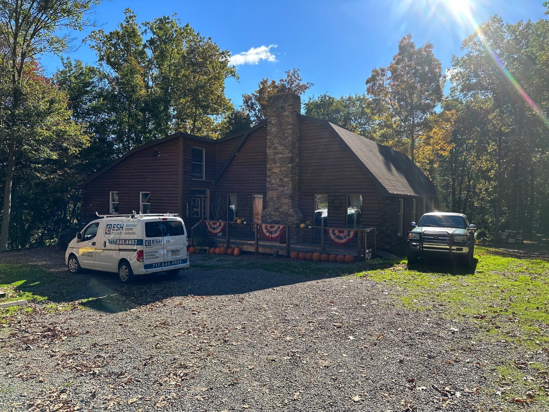 Log Cabin Standing Seam Metal Roof and Skylight Replacement by Esh Builders