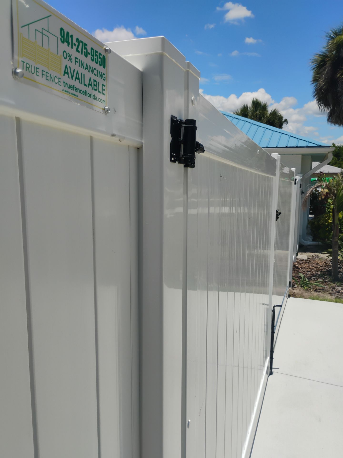 White Vinyl Privacy Fence Installation and Gate Repair in Port Charlotte by True Fence LLC