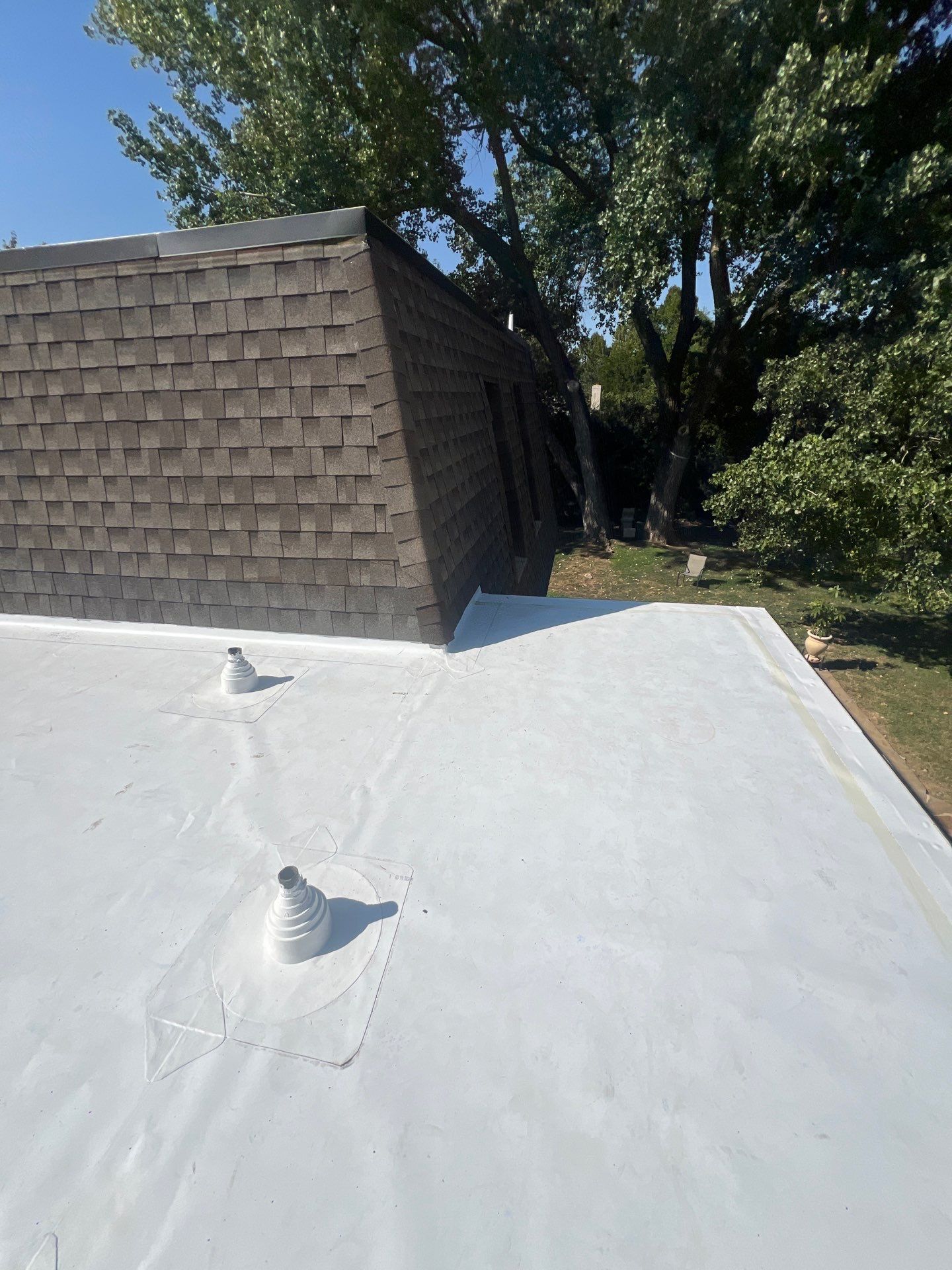 TPO Flat Roof Replacement in Edmond, OK by McCann's Roofing and Construction