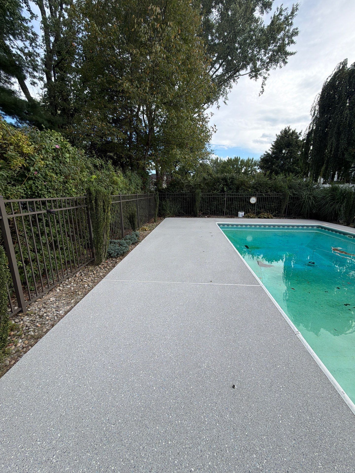 Blue Granite Pool Patio Concrete Coating in Lincoln Park by Spectrum Painting, LLC