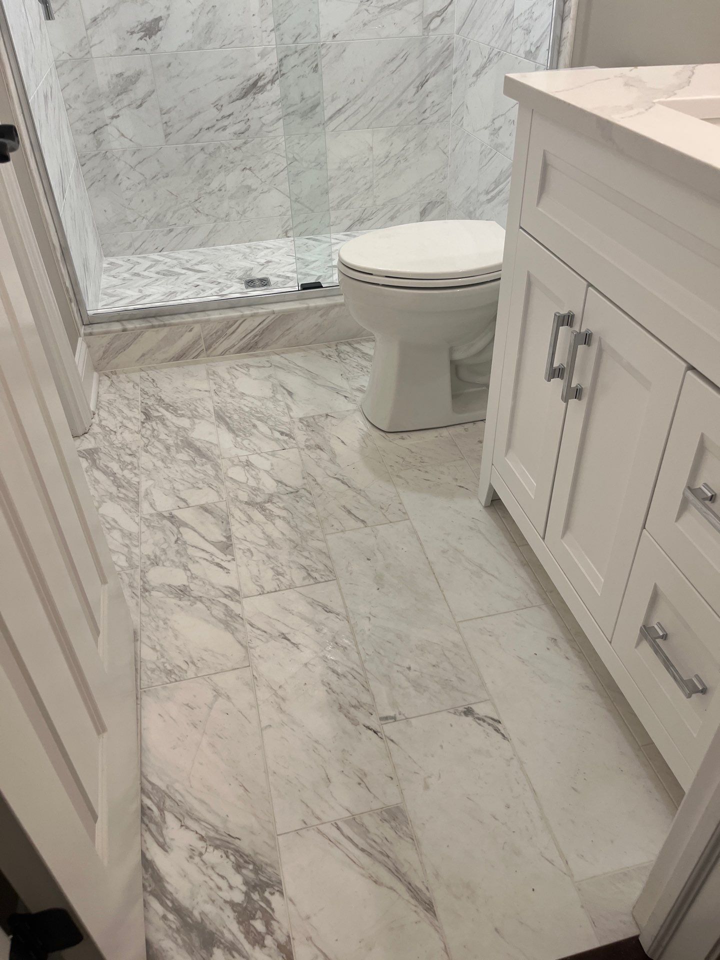 A Tan Bath Gets A Marble Makeover! by Snap Home Solutions