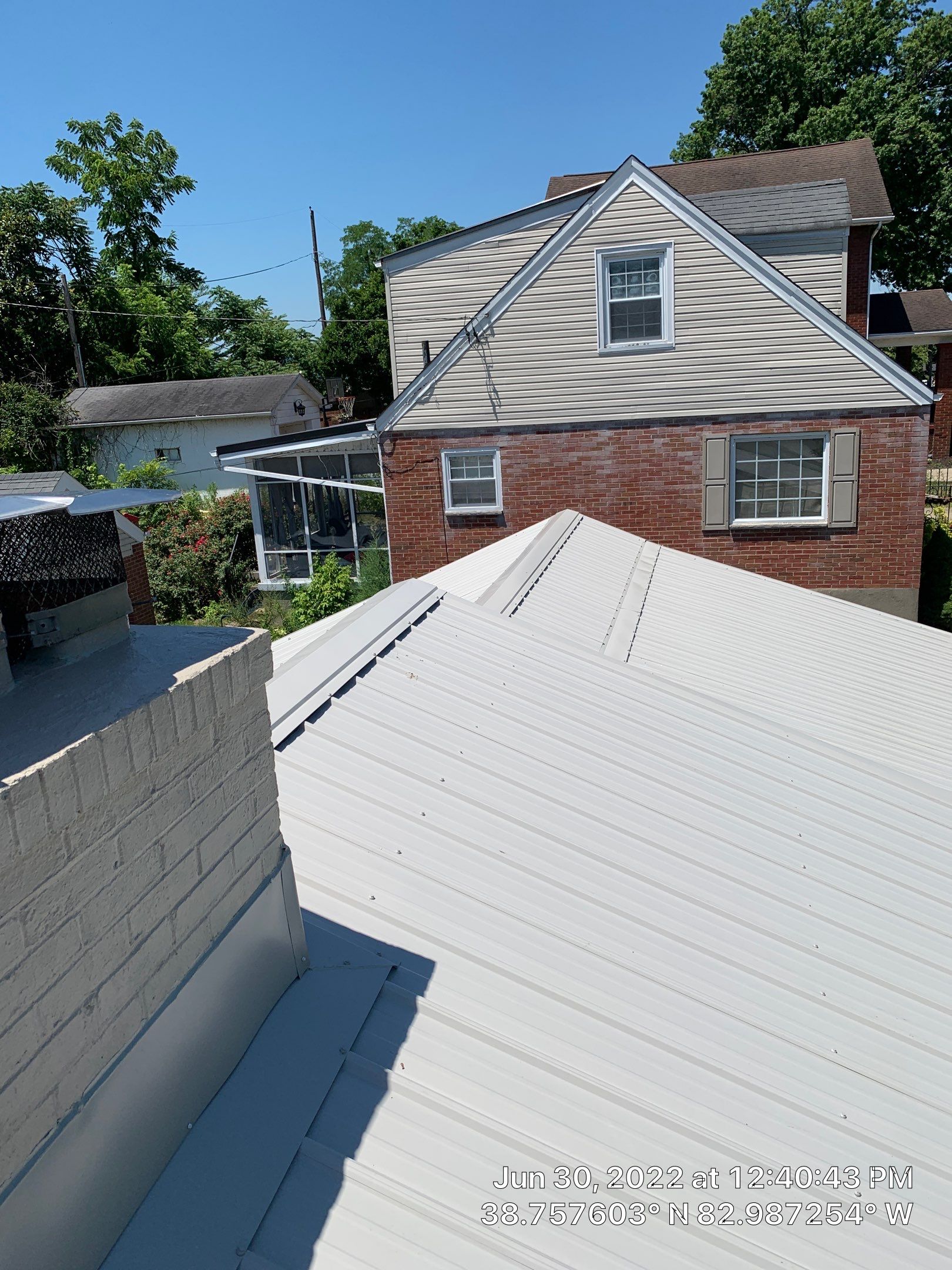 Metal Roofing, Skylights, Porch Build by Secure Construction Company Inc