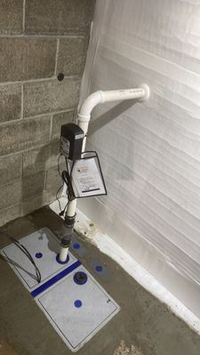 Interior Waterproofing with Steel Beam Reinforcement and Brick Tuckpointing