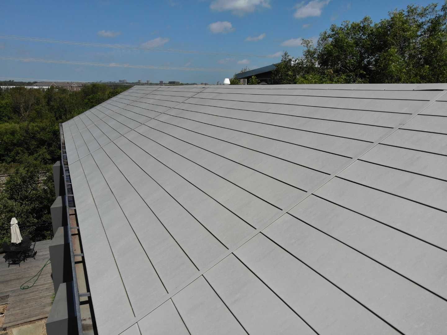 Metal Roofing project using MBCI Flexloc Panels - 22 gauge - silver metallic-in-color by Becker Roofing and Exteriors