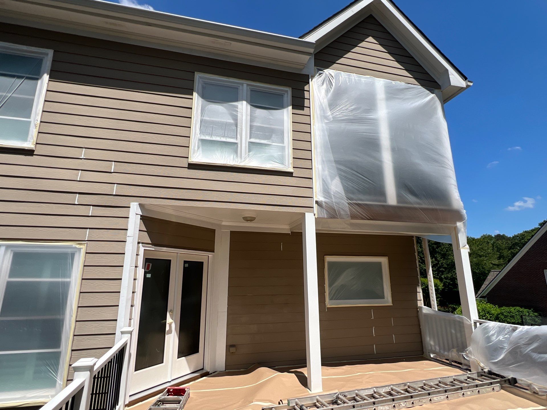 Full Exterior Siding Replacement and Stone Veneer Installation in Roswell by Swift Home Renovations