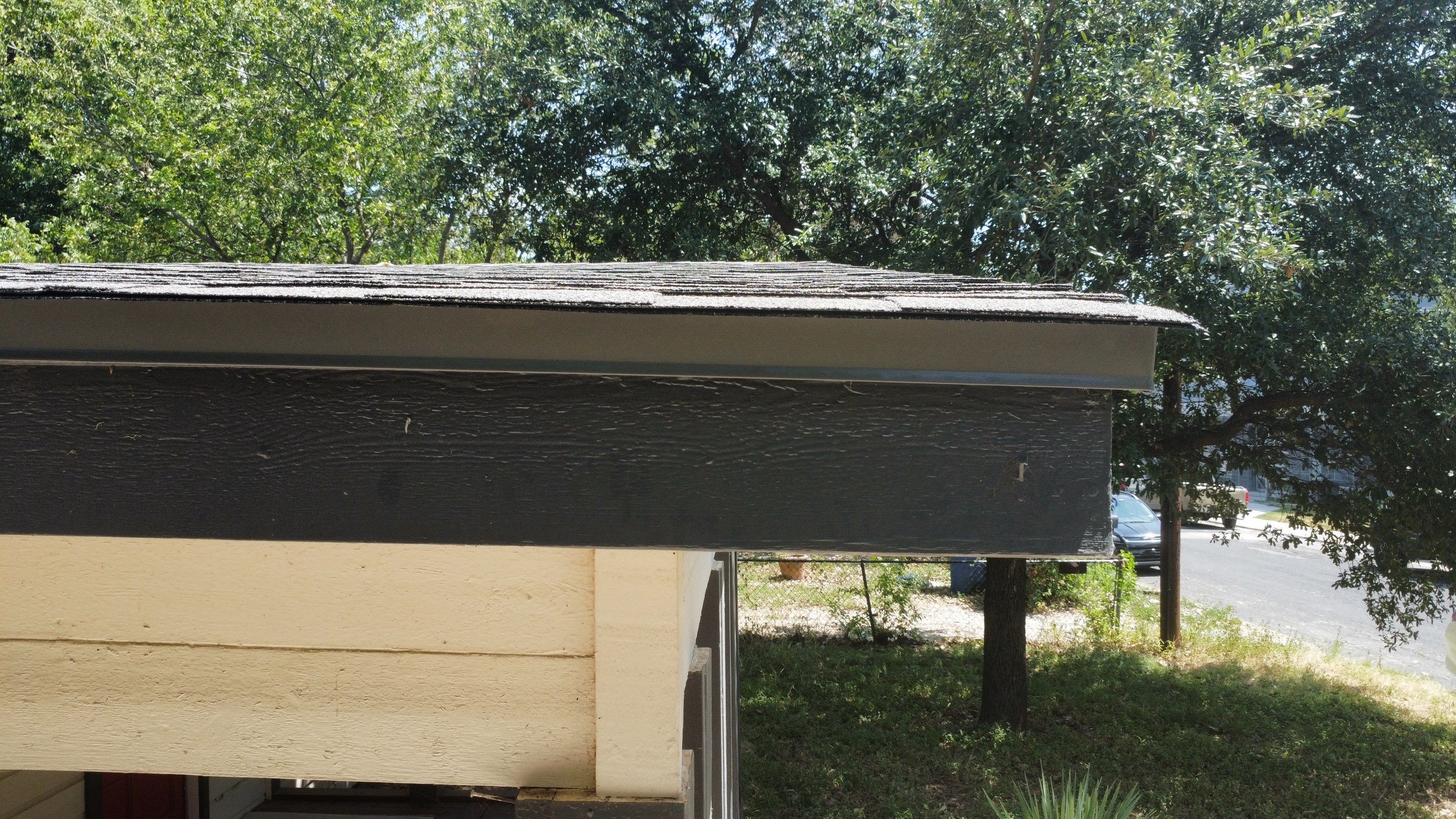 Mixed Roof System ā Oakridge Driftwood + Flat Roof Section | Austin, TX by Kstylez Roofing & Construction