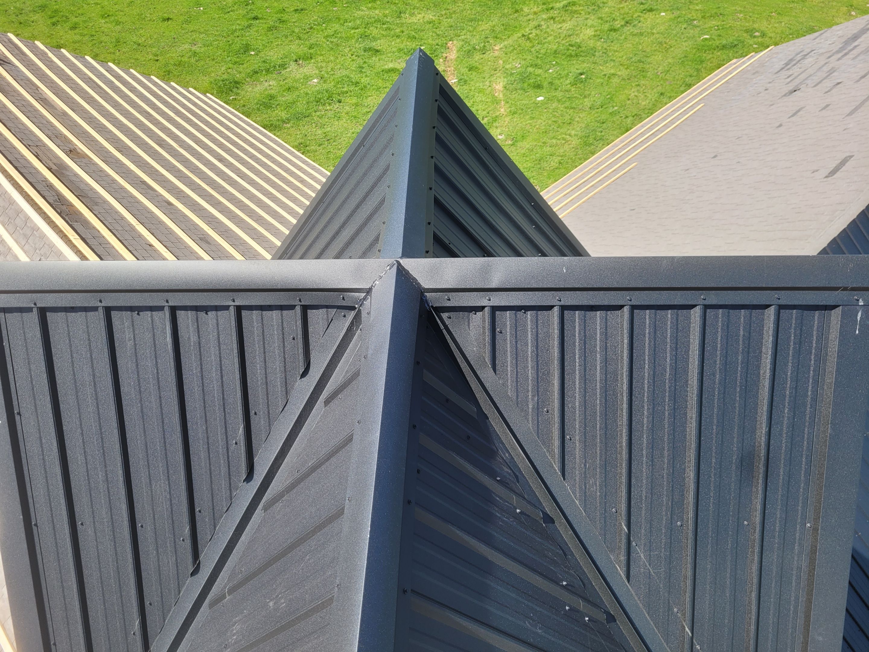 New metal roof on heirloom barn by Dagny Builders