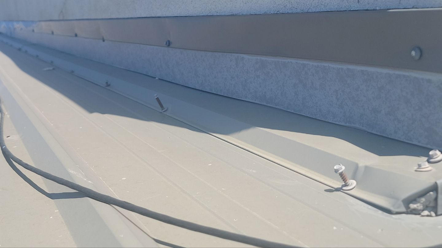 Commercial Roof Replacement – PBR Metal Panels After Hail Damage by ASAP Roofing & Exteriors