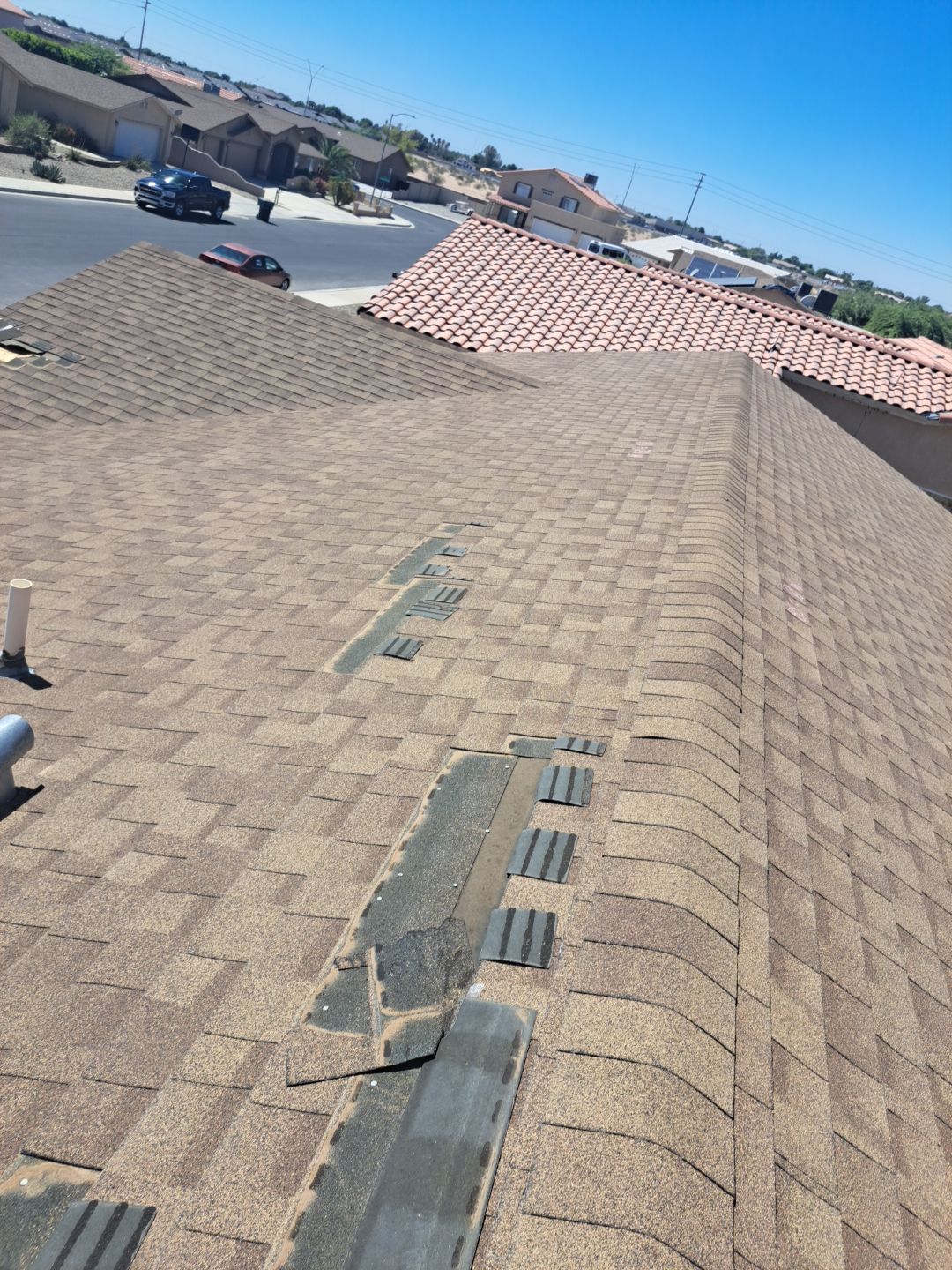Estate Gray Shingles by Reimagine Roofing