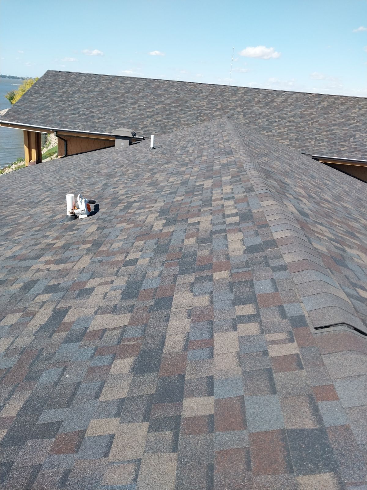 Commercial Roofing Installation using Shingles by Grell Roofing, LLC