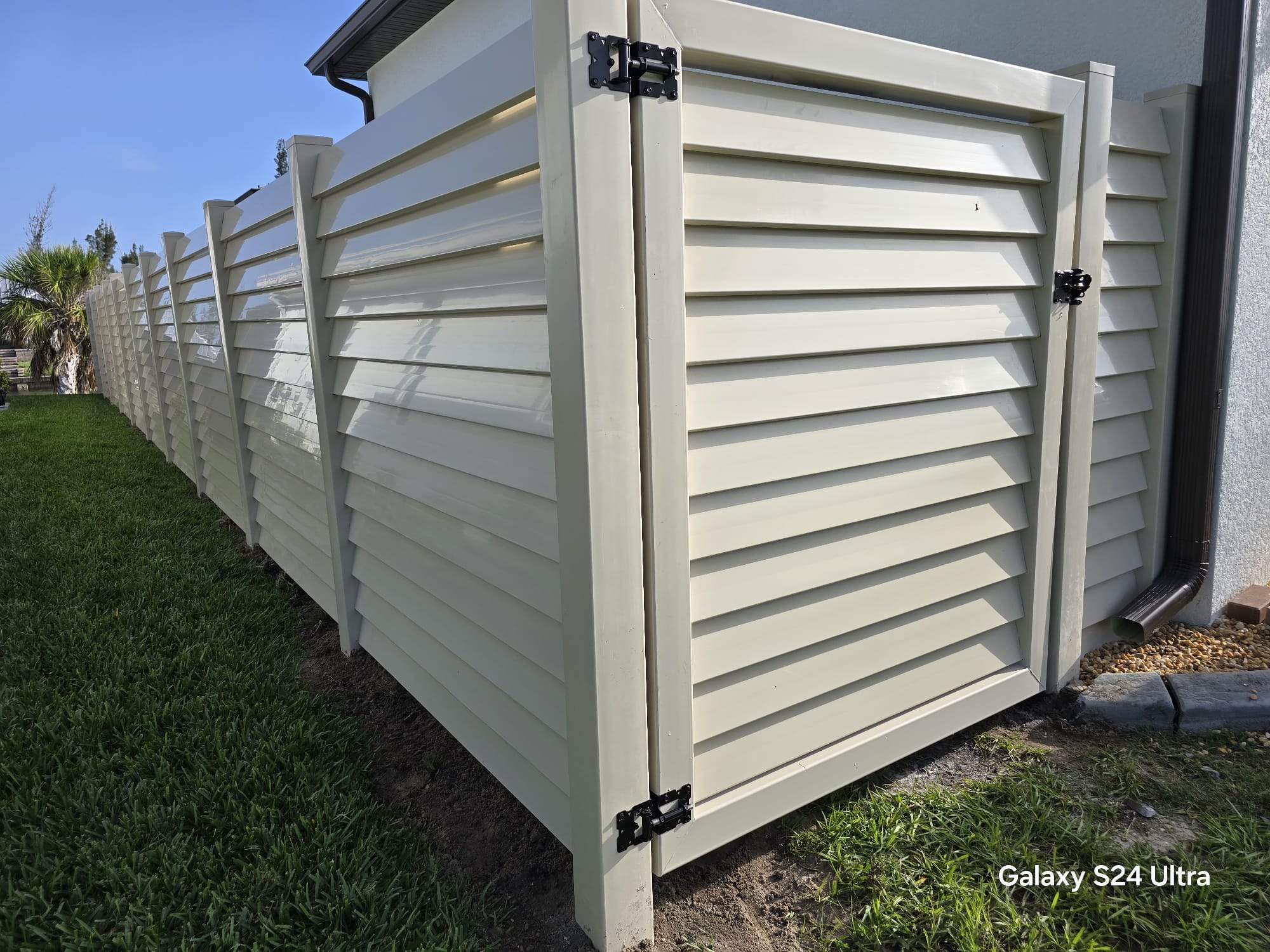 Tan Louvered Vinyl in Port Charlotte by True Fence LLC