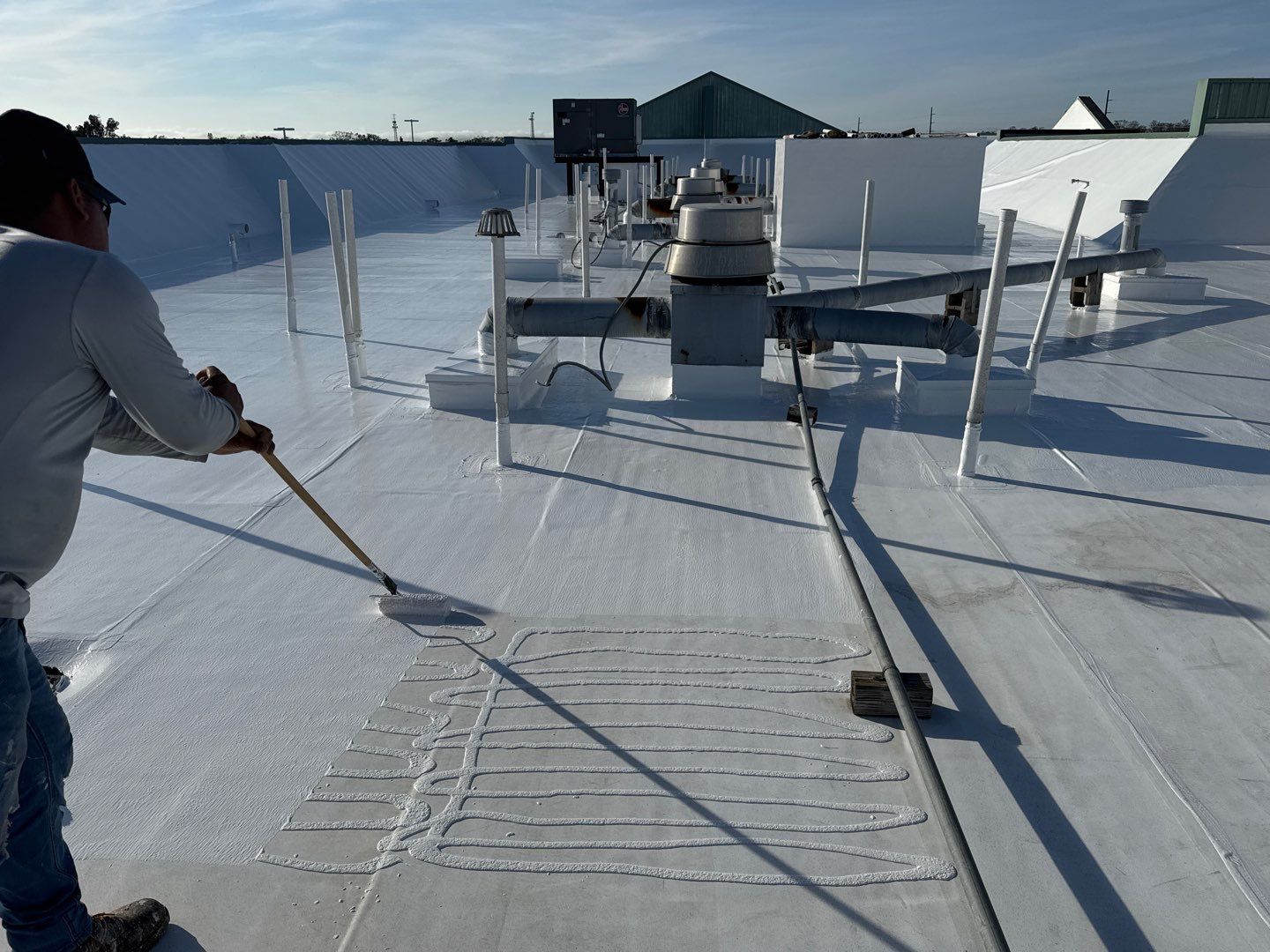 Commercial White Silicone Roof Coating for Hotel in Oldsmar by CES Roofing