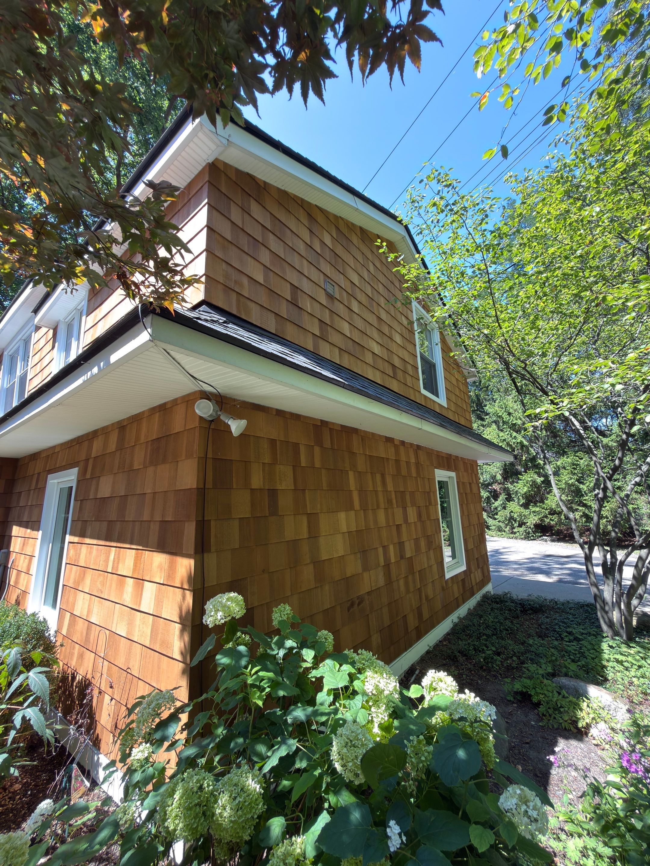Cedar Siding Replacement  by Bloomfield Construction & Restoration