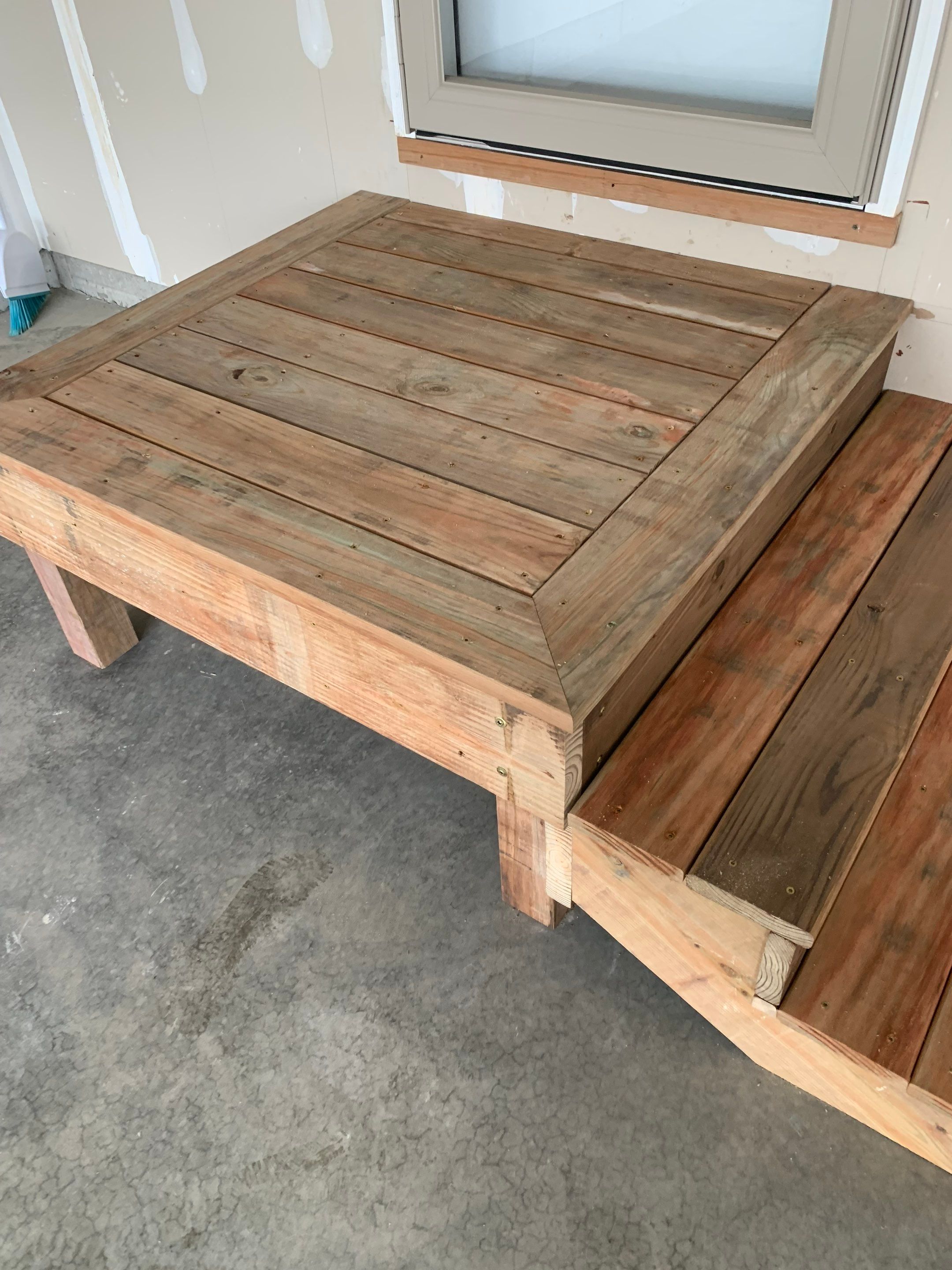 Garage Interior Finishing and Custom Wood Step Construction in Sioux Falls by Select Painting, Coatings & Garage Cabinets