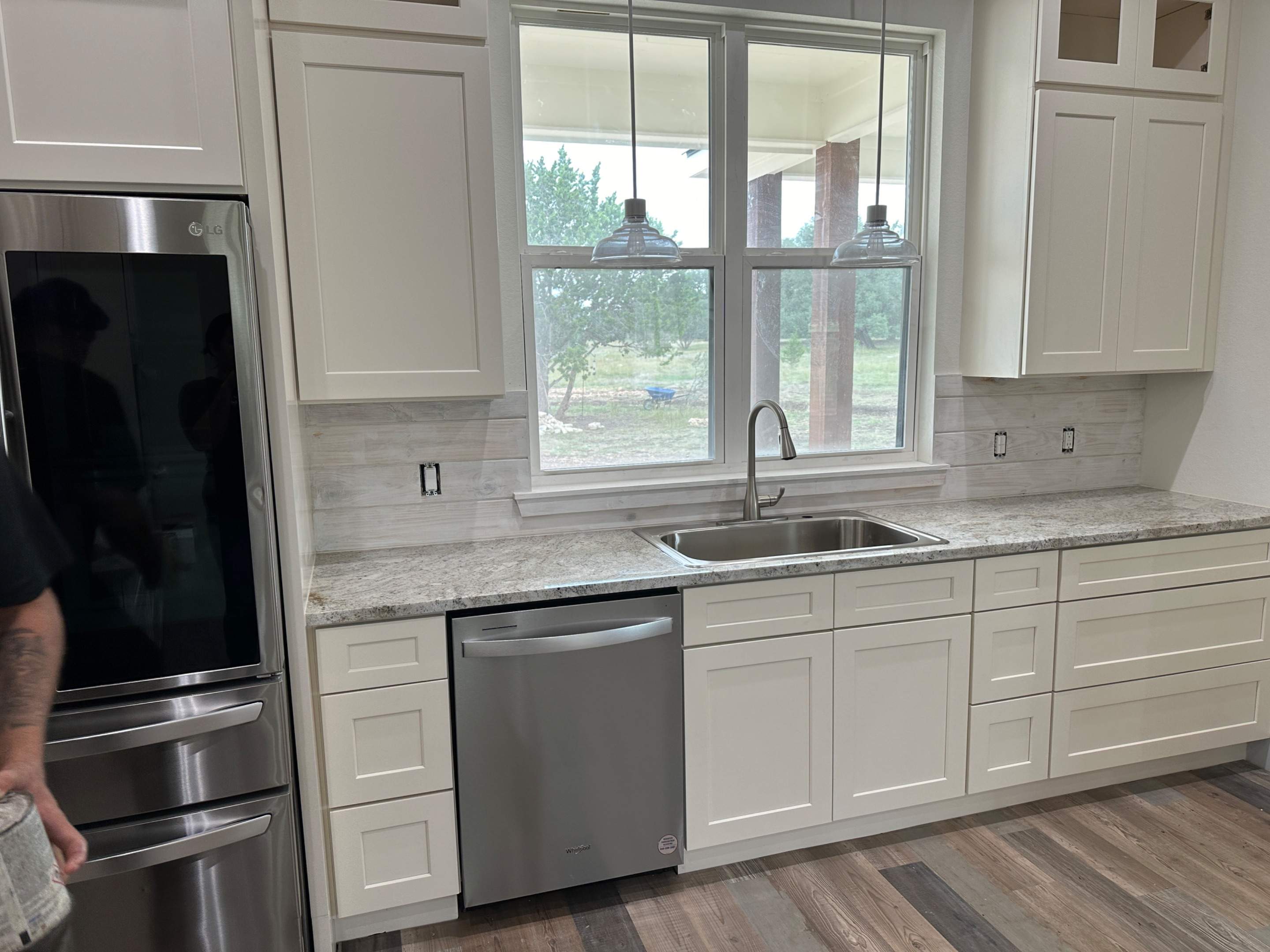 Antique shaker cabinets and granite kitchen and bathroom installation by Mena stone surfaces