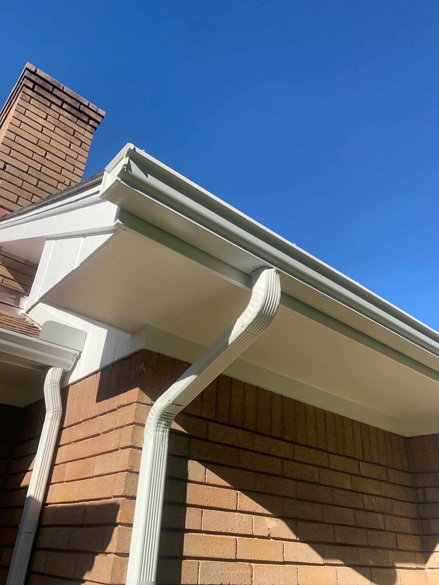 gutter install & soffit repair & exterior paiting in Oklahoma City by McCann's Roofing and Construction