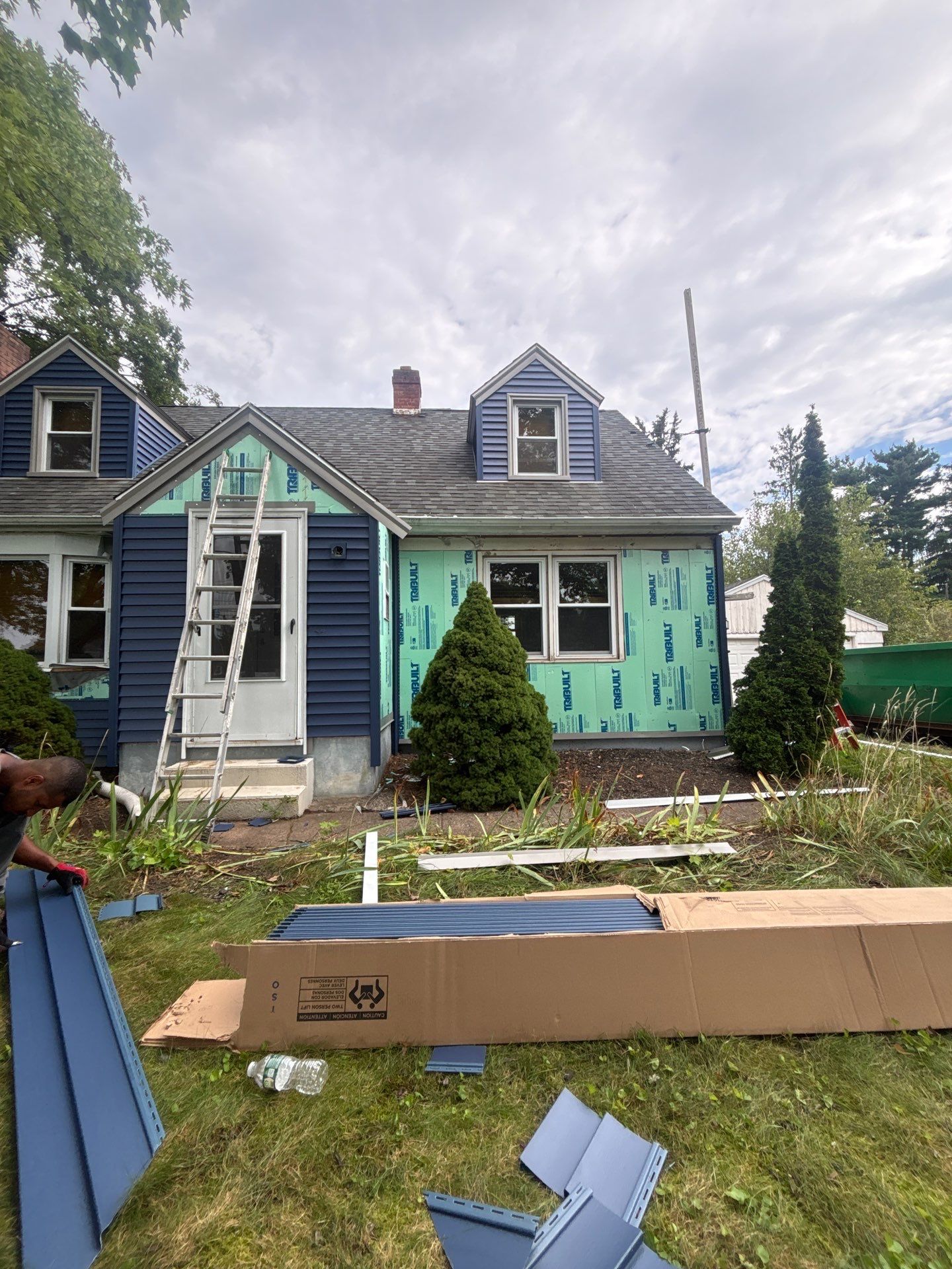 Siding Renewal Using CertainTeed Monogram D/4 Clapboard in Midnight Blue by DiGiorgi Roofing and Siding Inc