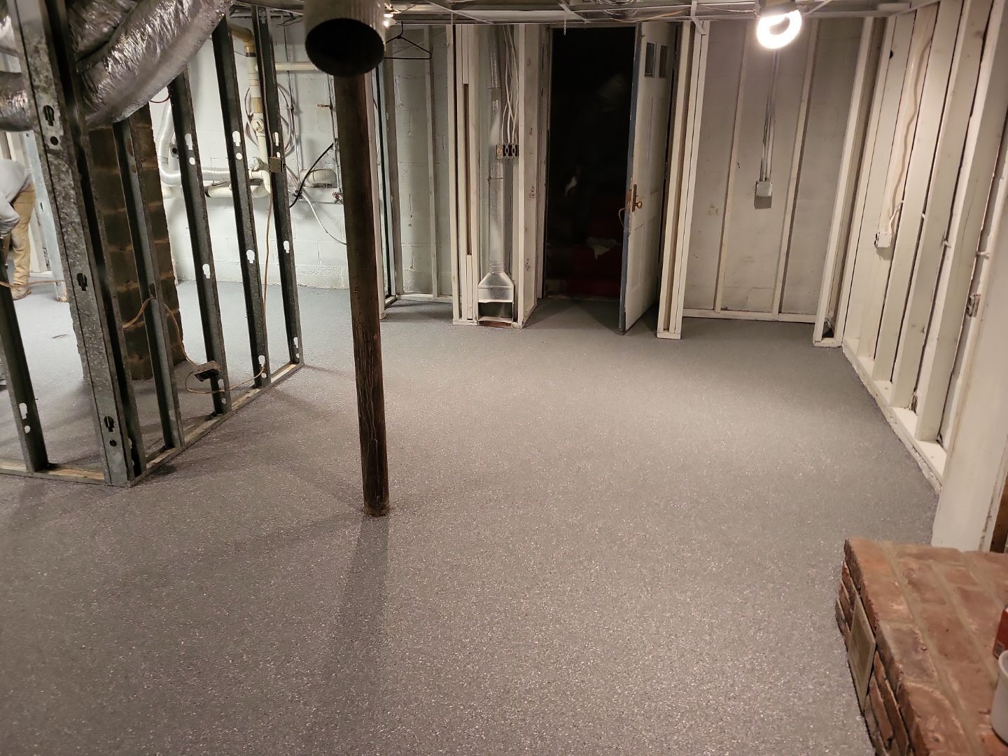 Basement Concrete Floor Coating with Penntek Flake System by Spectrum Painting, LLC