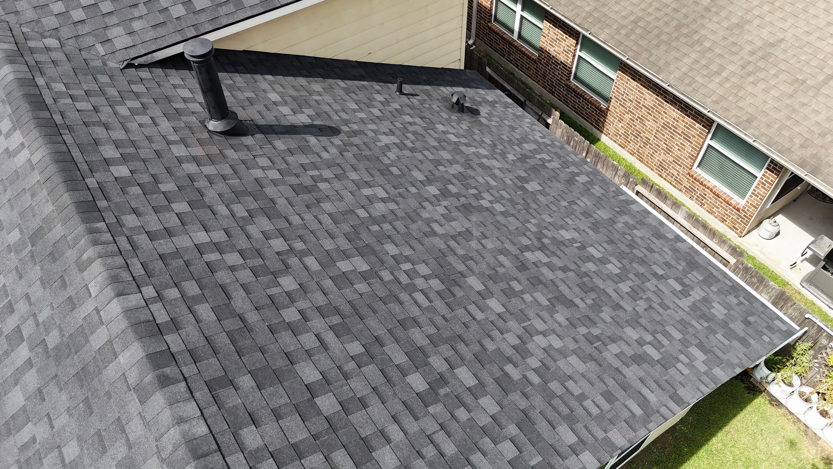 Residential Roofing Installation using IKO Dynasty after Storms in Cypress by Core Four Roofing