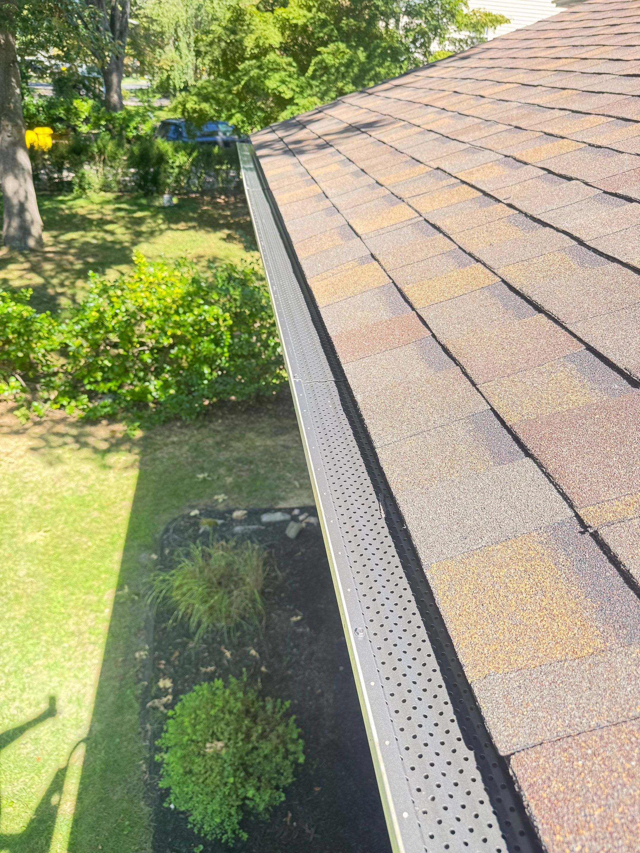 Full Roof Replacement and Gutter Guard Installation in Pasadena, Maryland by First Chesapeake Roofing