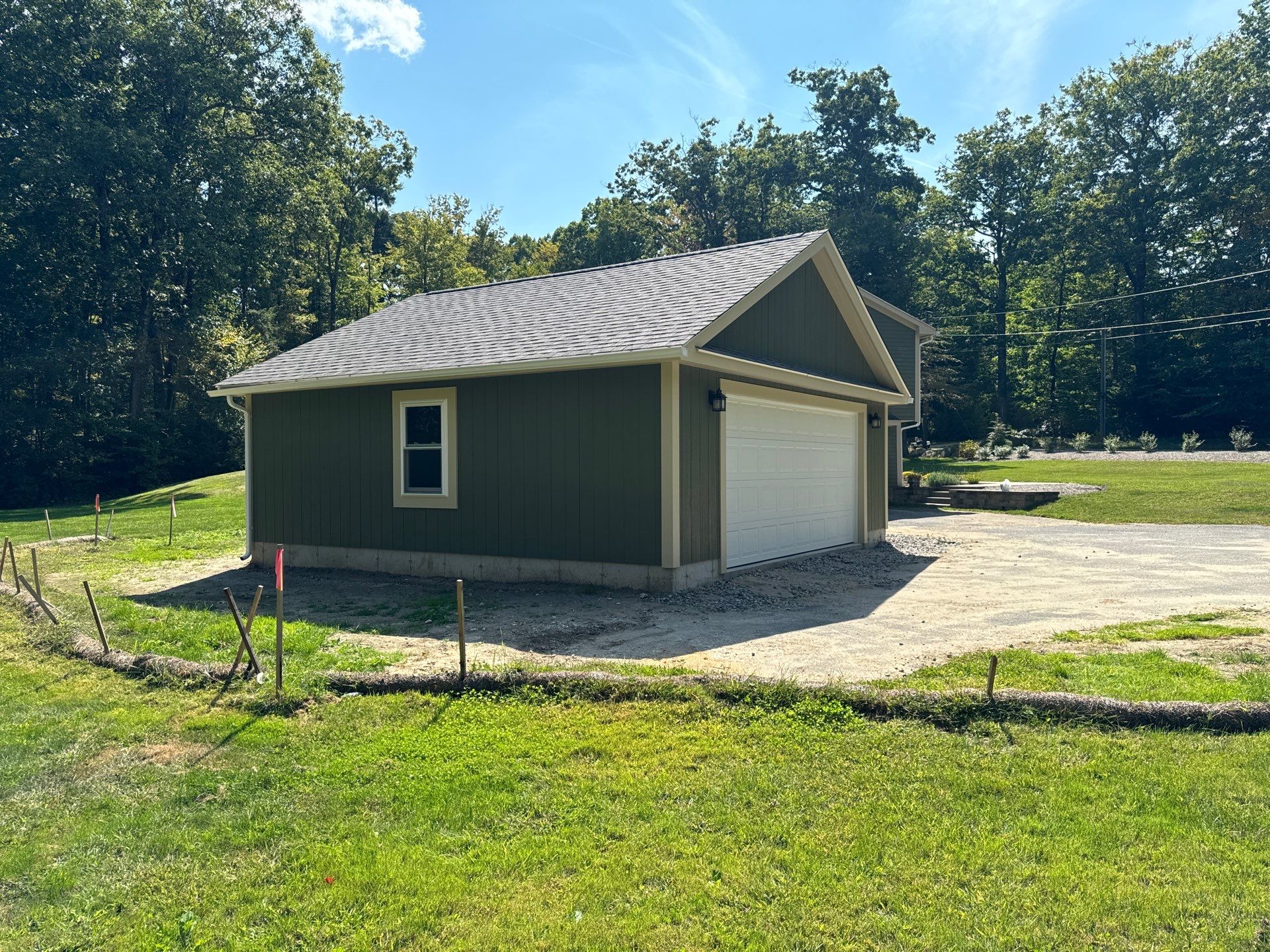 Two-Car Garage using LP SmartSide Panel Siding by Chagnon Building & Remodeling LLC