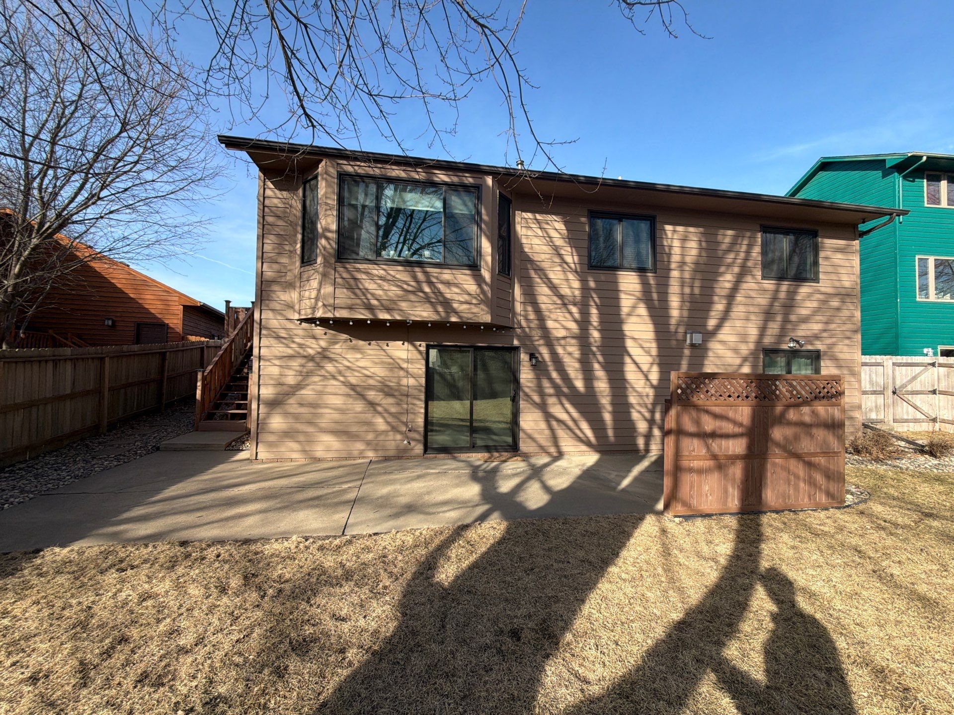 Wood Siding Restoration and Exterior Painting in Sioux Falls by Select Painting, Coatings & Garage Cabinets