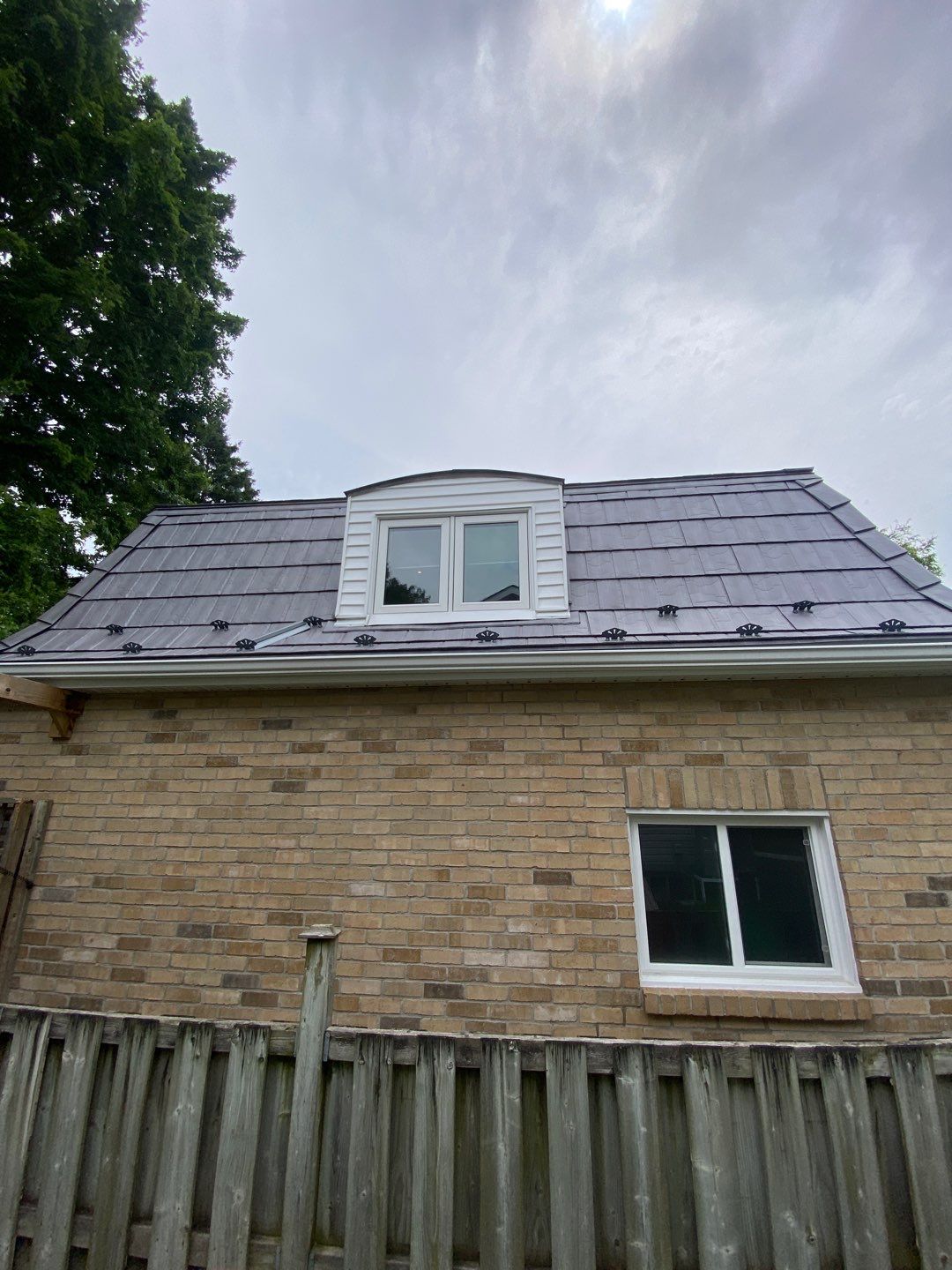 Metal work using Vicwest True Natuer. Metal Shingle by Jay Carter Roofing & Sheet Metal