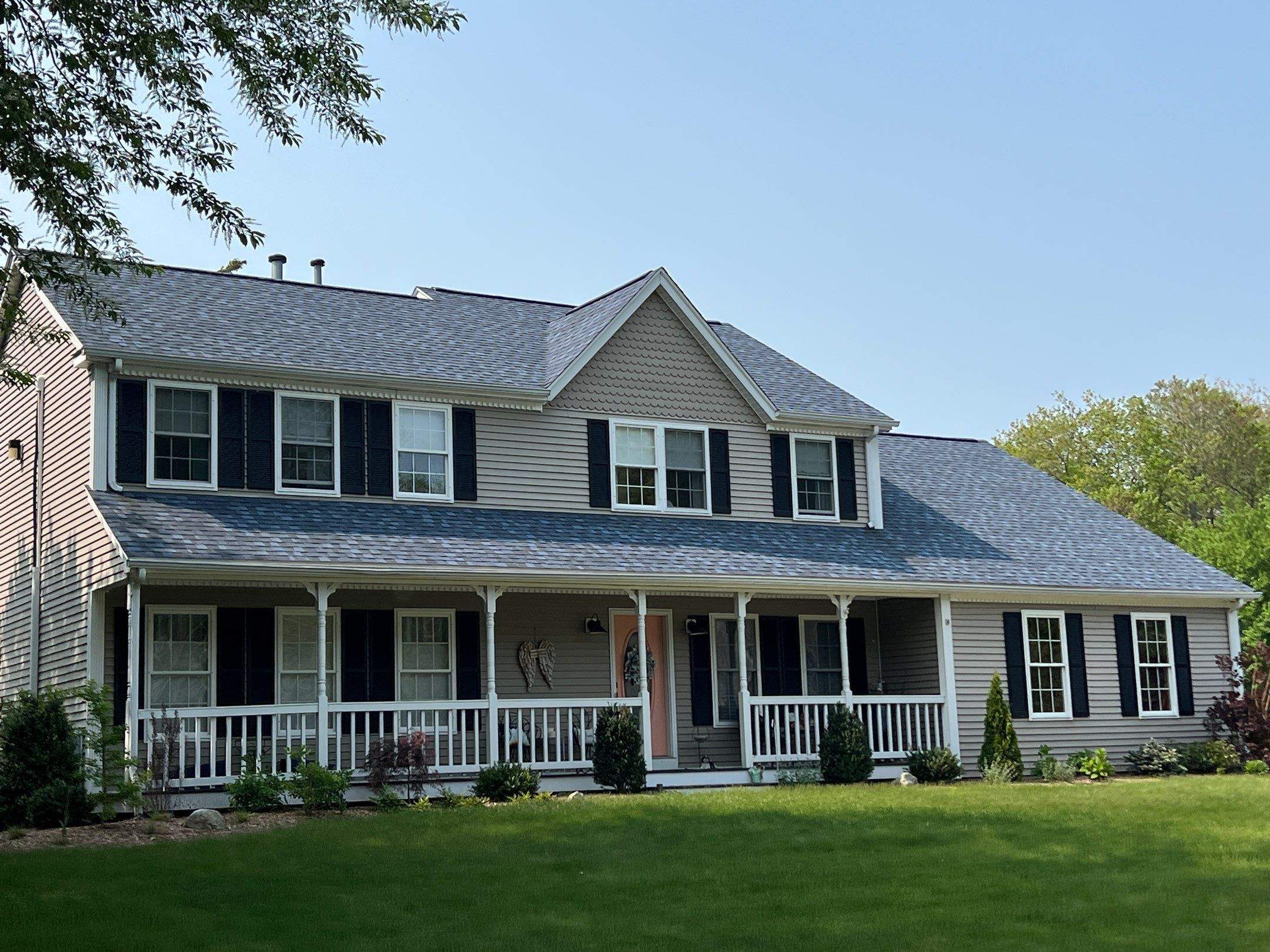 Coastal Blue Roofs by Pinnacle Roofing & Skylights