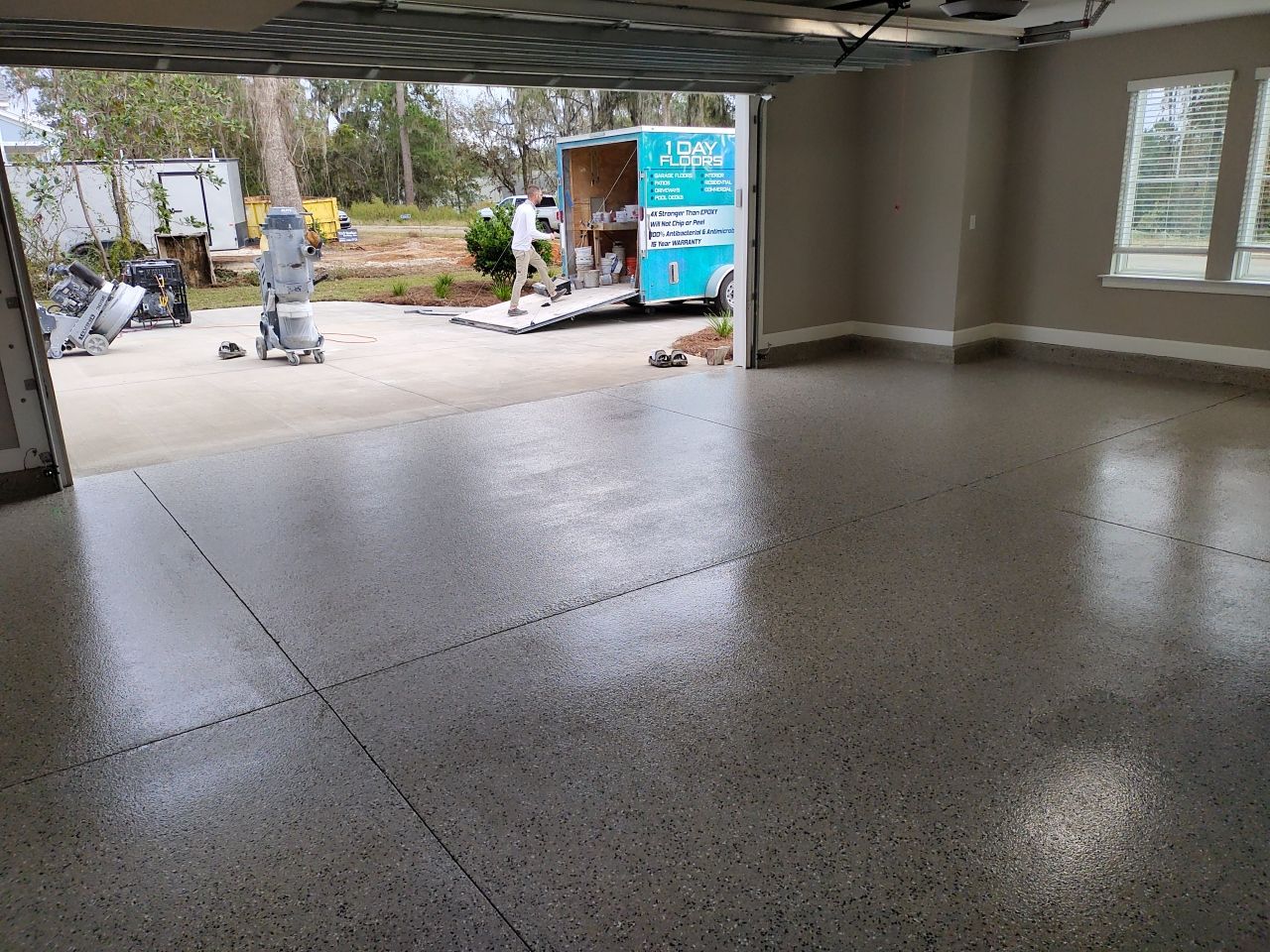 Mediterranean Car Garage! by Deese Elite Concrete Coatings