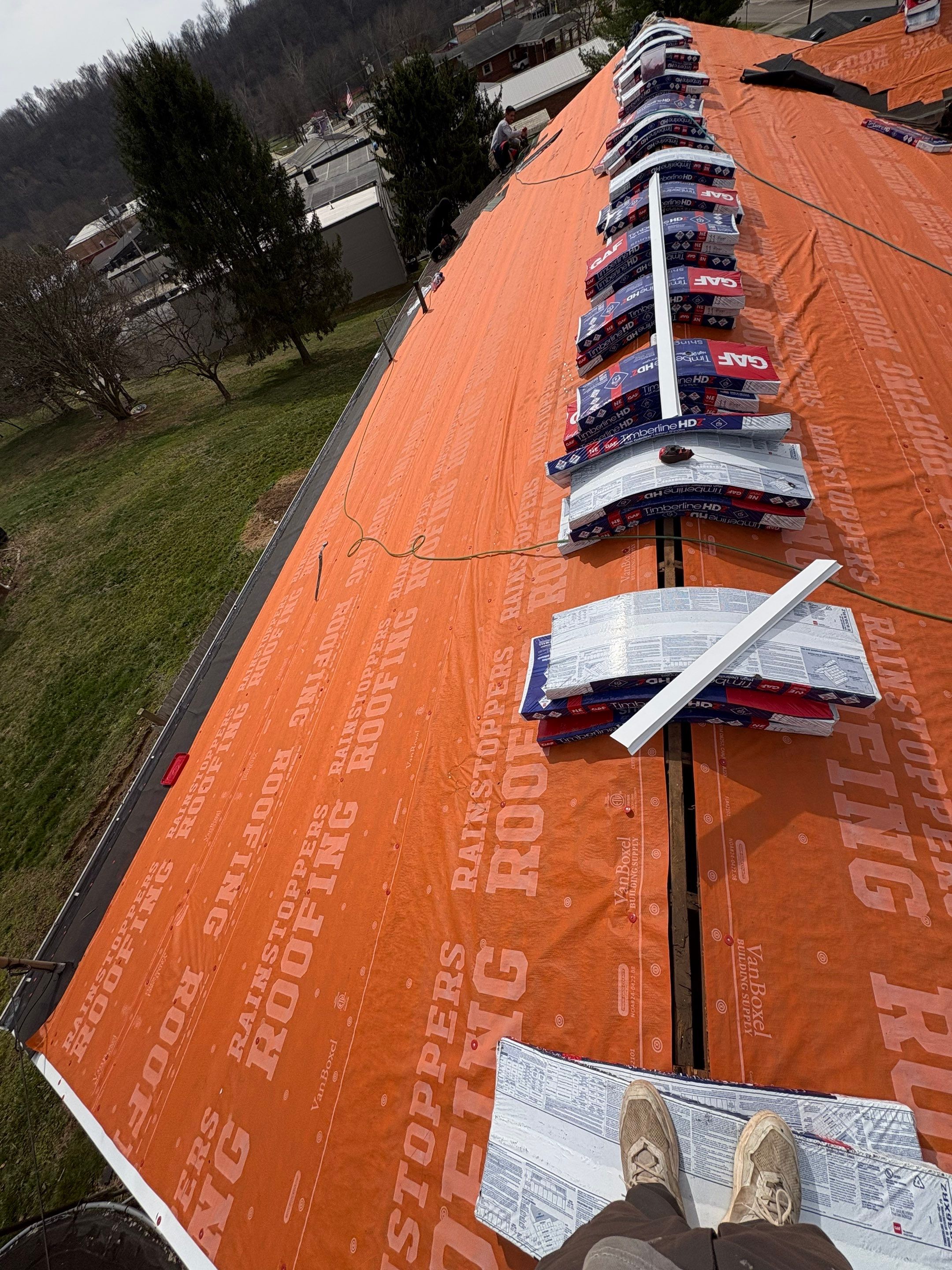 Residential Roofing Installation using GAF TImberline HDZ Hickory by Rainstoppers Roofing