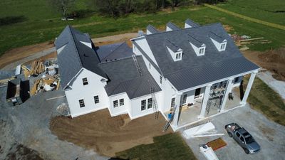 Residential Roof Install - Shingles and Standing Seam Metal