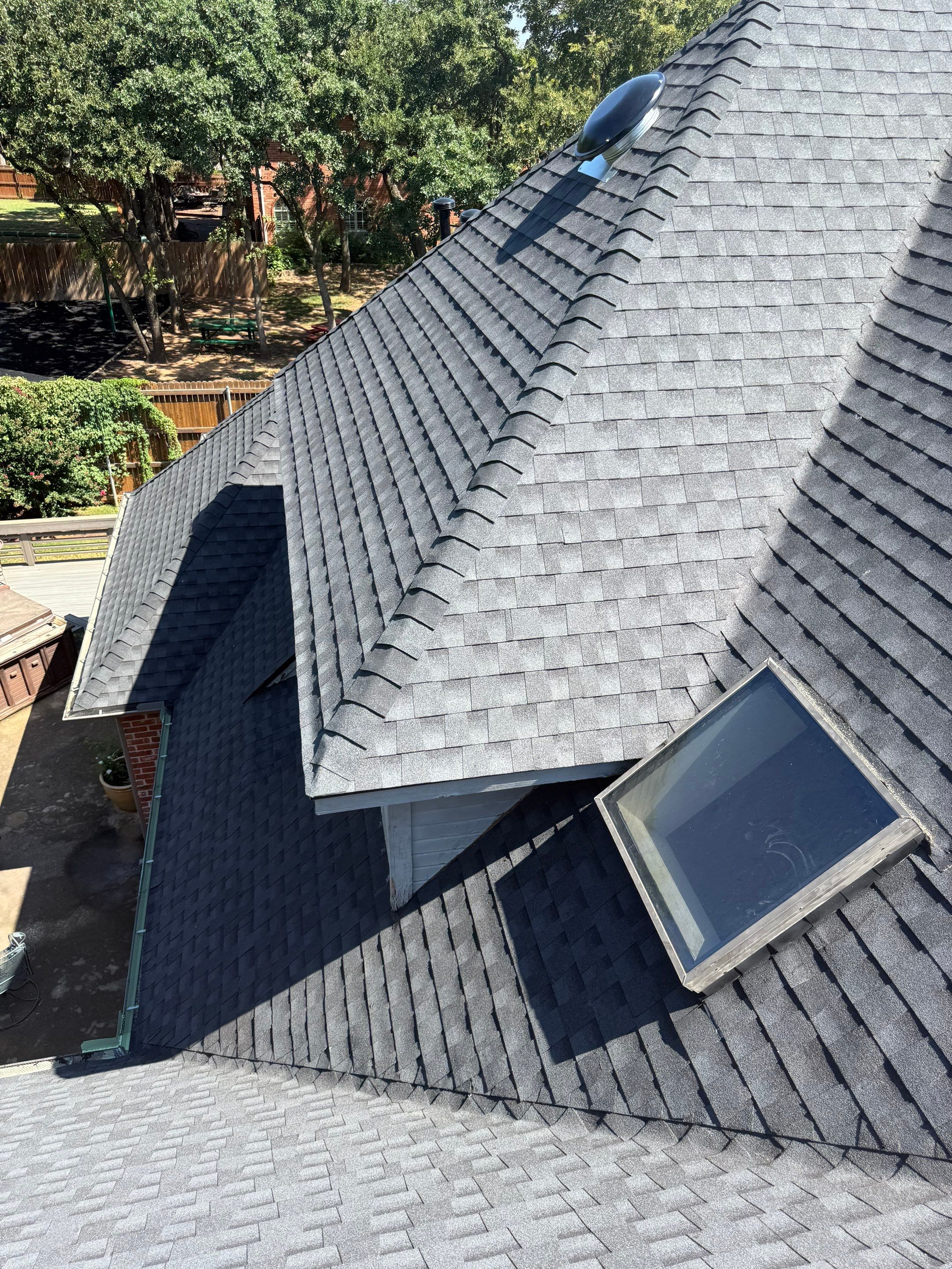 roof replacement & skylight repair in Edmond by McCann's Roofing and Construction