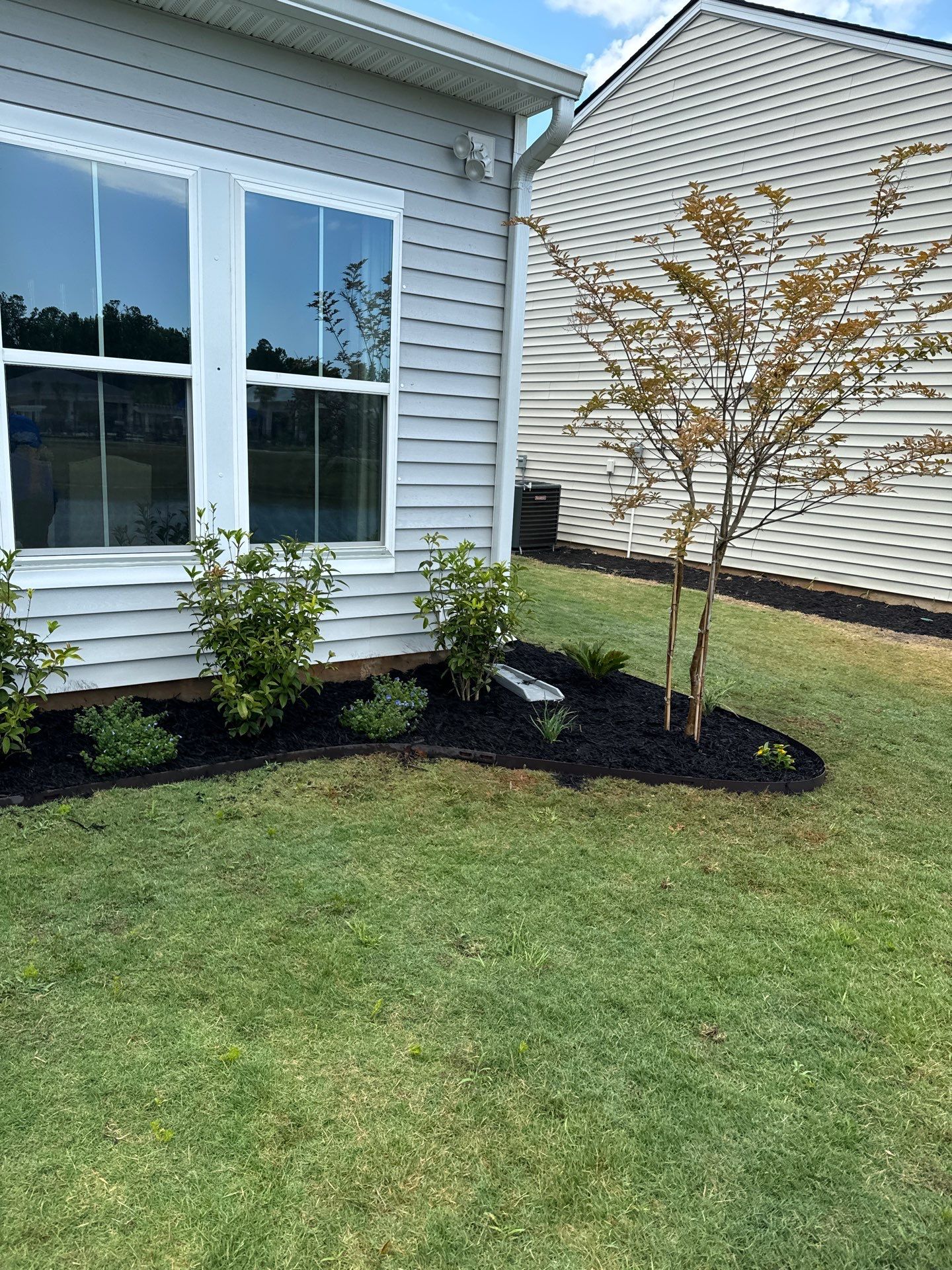 Custom Herringbone Paver Patio and Professional Landscaping in Bluffton by Lowcountry Scapes, LLC