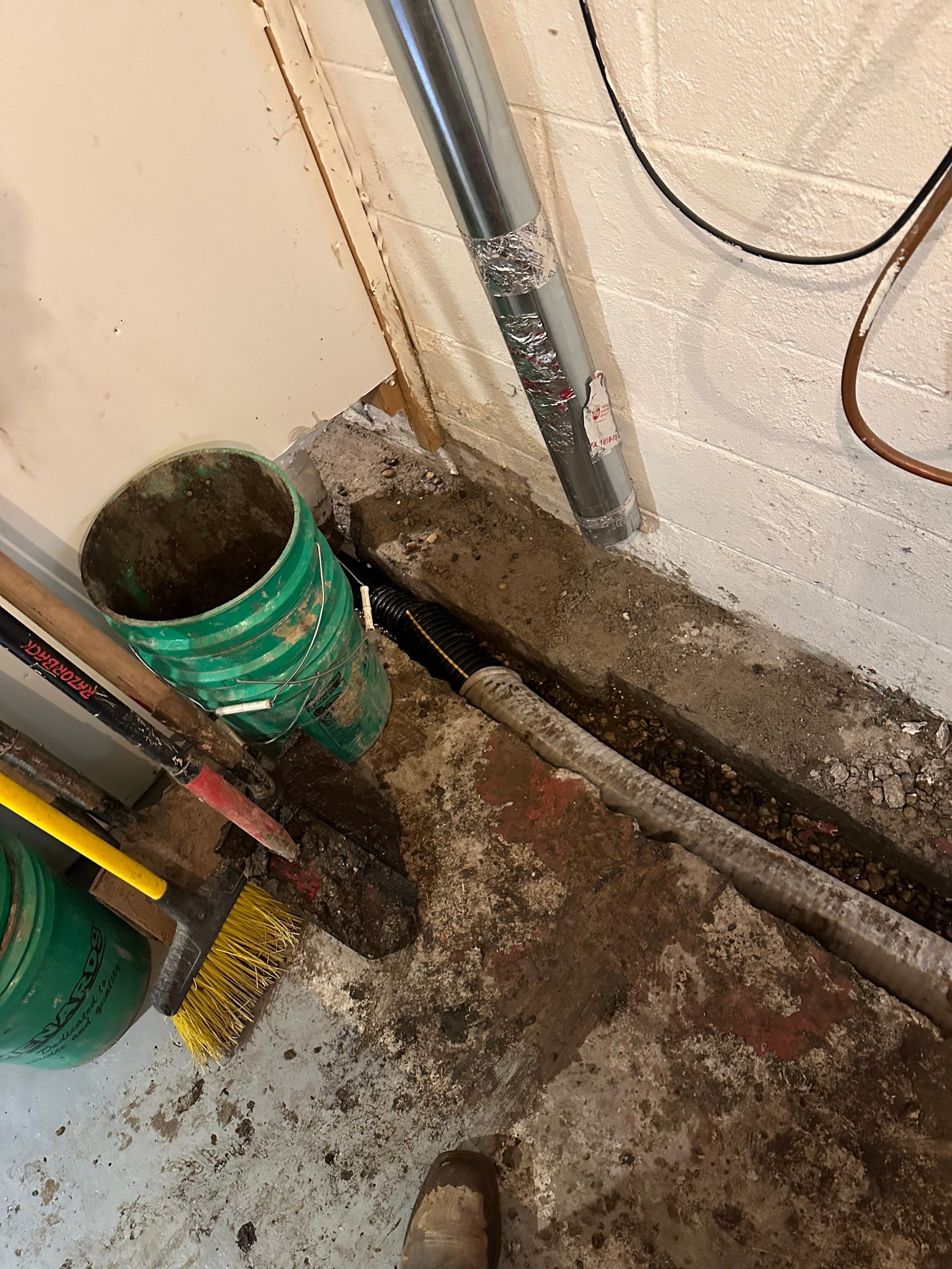 Solving a One-Wall Water Issue in St. Paul by Waterproofing Northeast