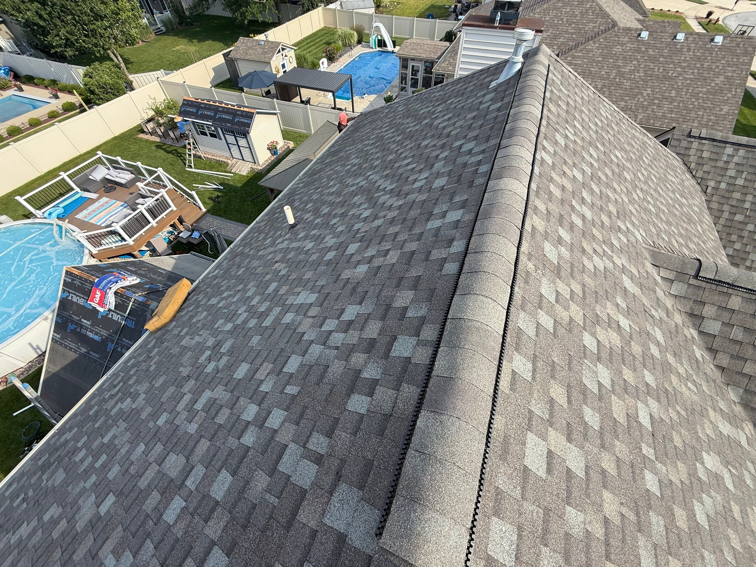 Roofing, siding & gutters by Optimal Home Improvement 