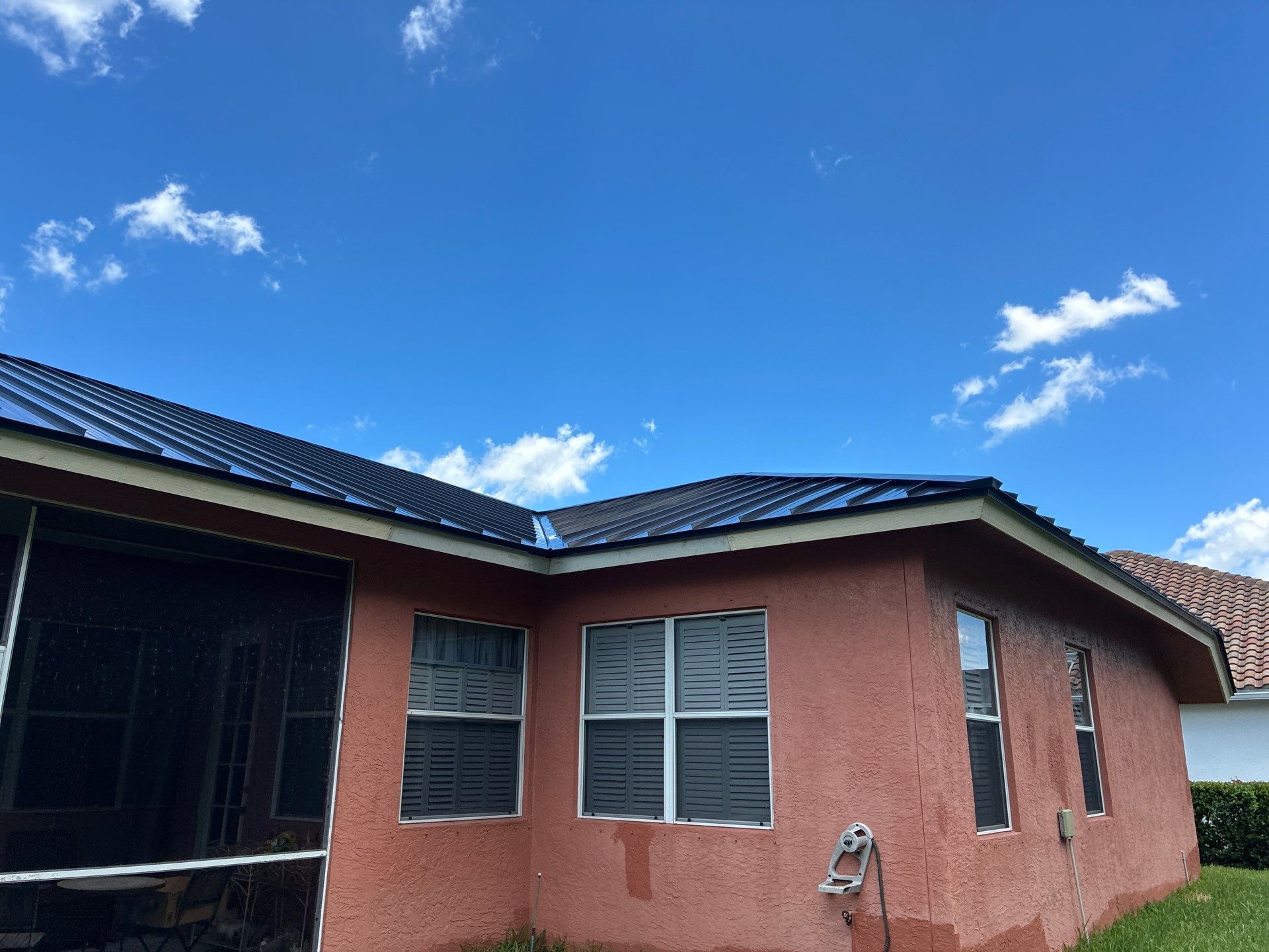 24ga 1.5" Mechanical Seam Matte Black by Total Roofing System The Metal Roof Experts