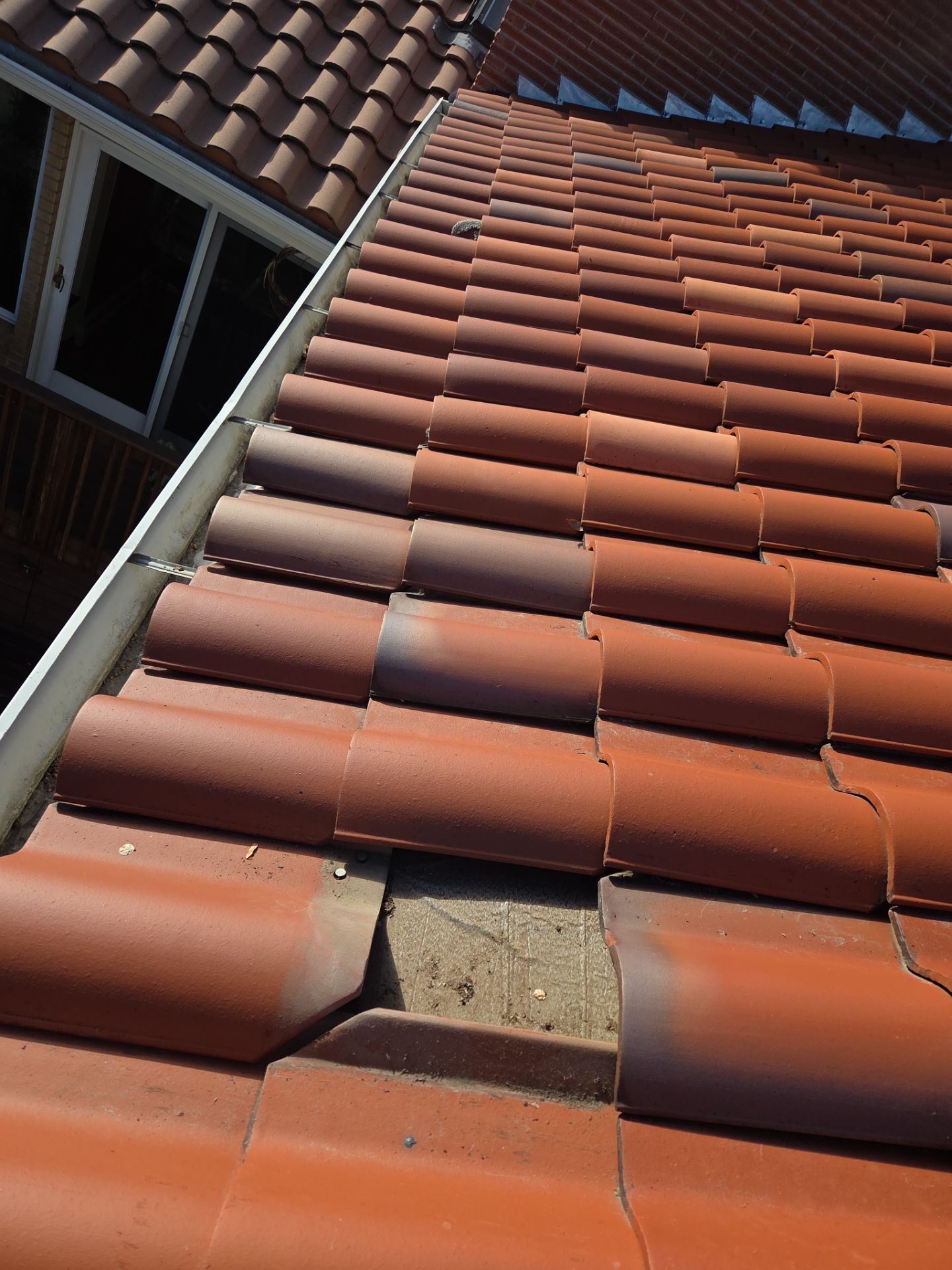 Low Slope Roof Coating / Broken Tile Replacement by RTP Roofing Company