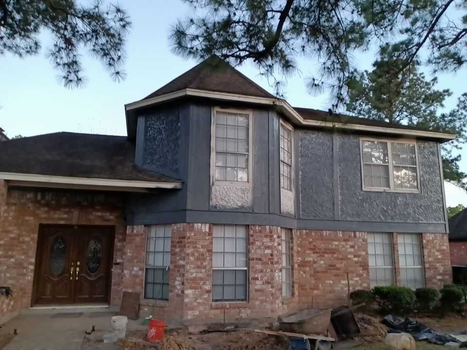 Interior and exterior painting project by Roof Concepts Construction