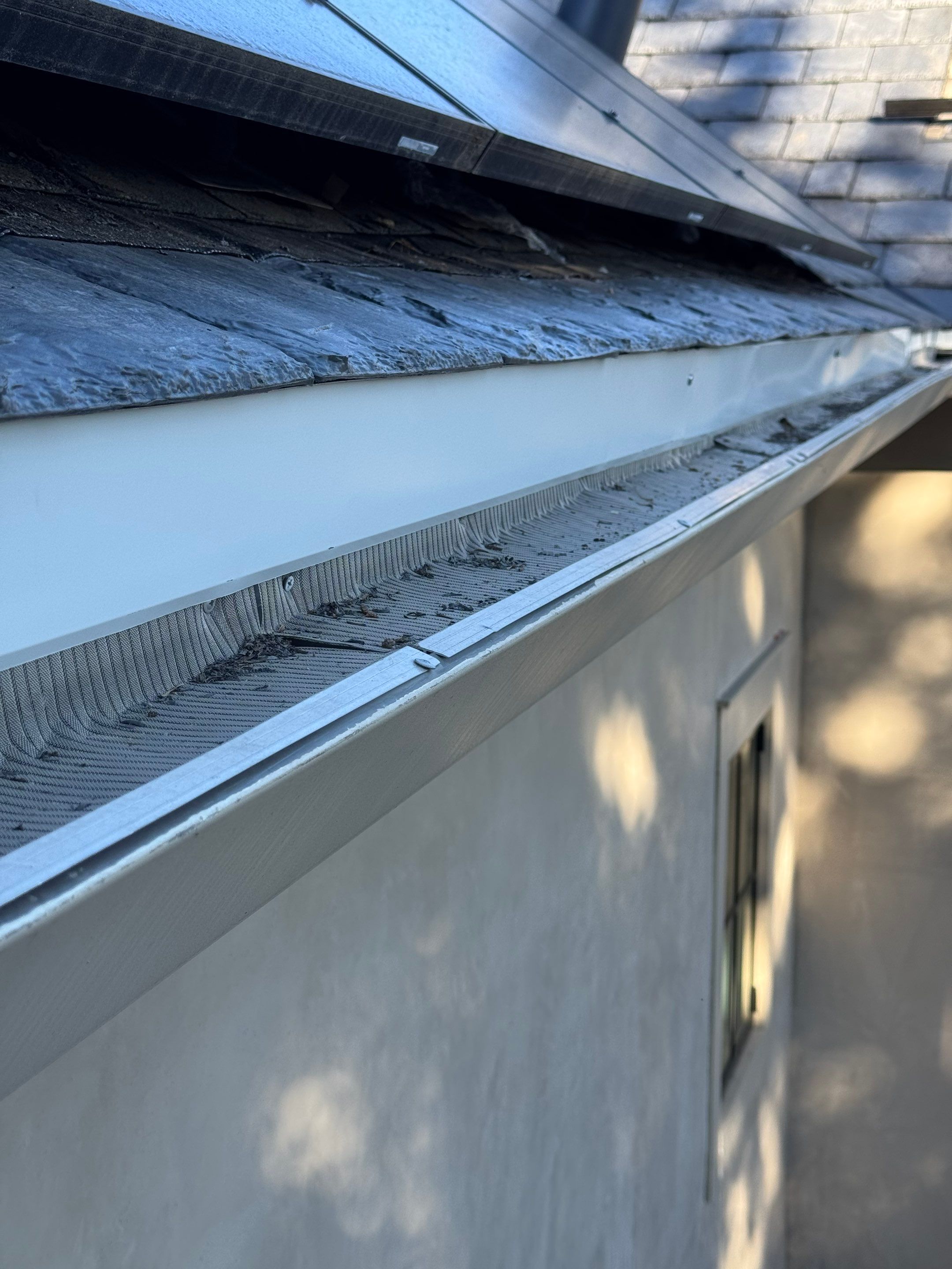 Residential Roofing Installation using Slate by Acker Roofing