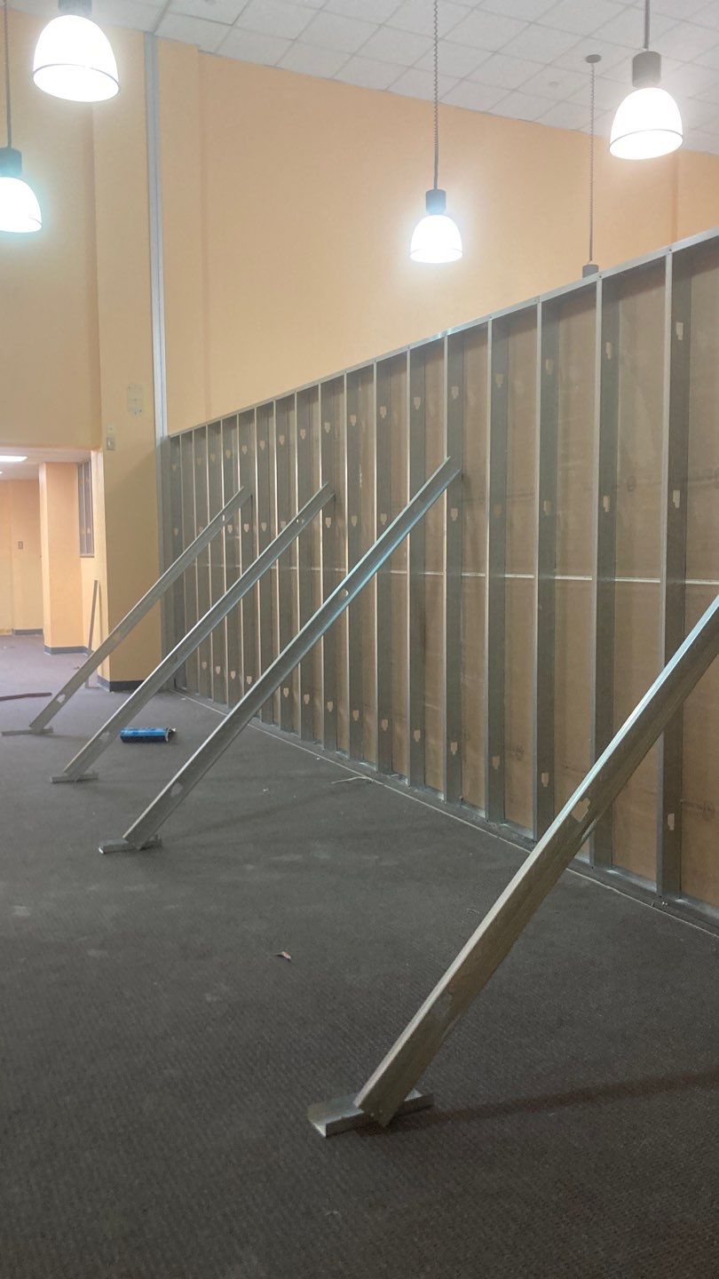 Wall Repair and Door Installation by Dodson House Moving