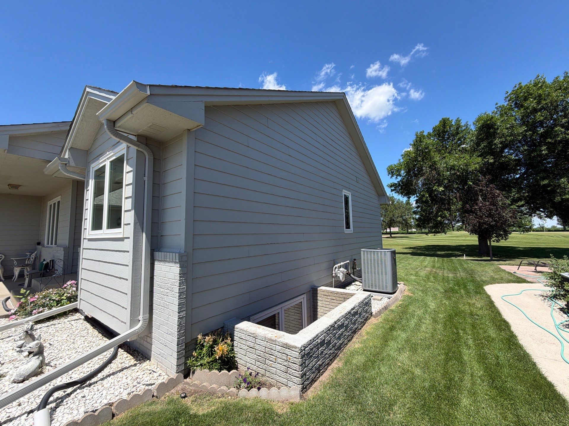 Full Exterior Painting and Siding Refresh in Hartford by Select Painting, Coatings & Garage Cabinets
