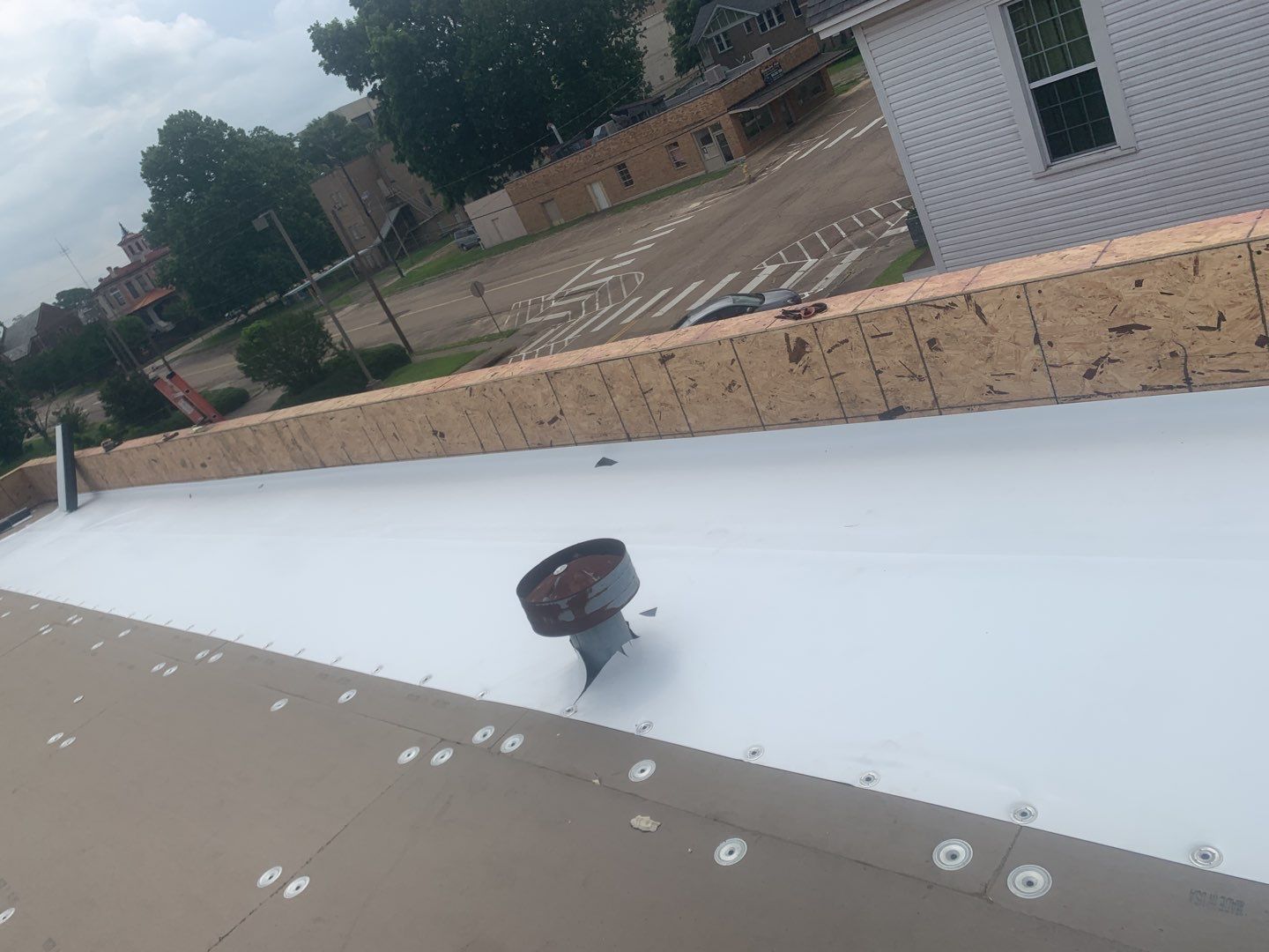 Commercial Roofing Installation using 50 mil PVC by Hostetler Roofing