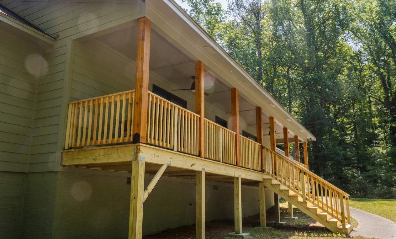 Smyrna, GA Full James Hardie Siding Replacement and Wood Front Porch Rebuild  by Nelson Exteriors 