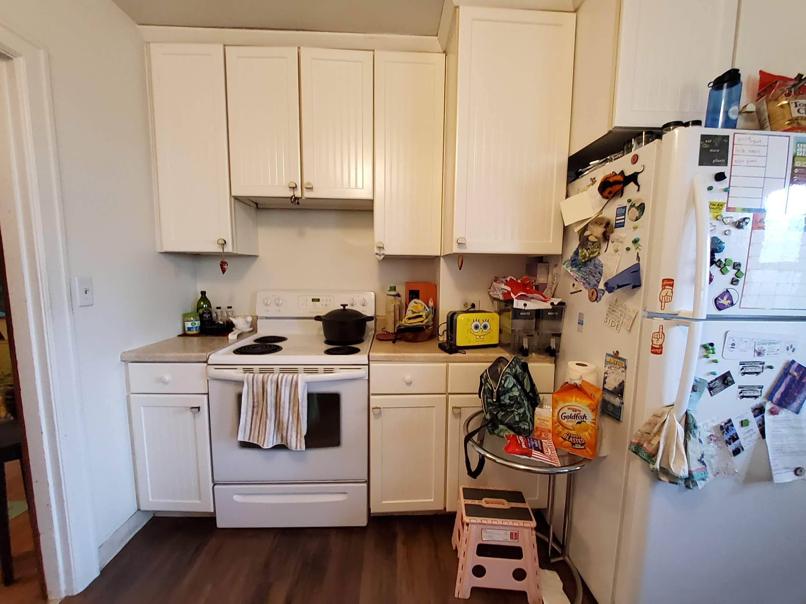 Complete Kitchen Remodeling Featuring Terracotta Tile and Wood Cabinetry by American Made Construction 