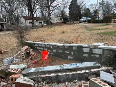 Retaining wall repair by Atlanta Landscape LLC