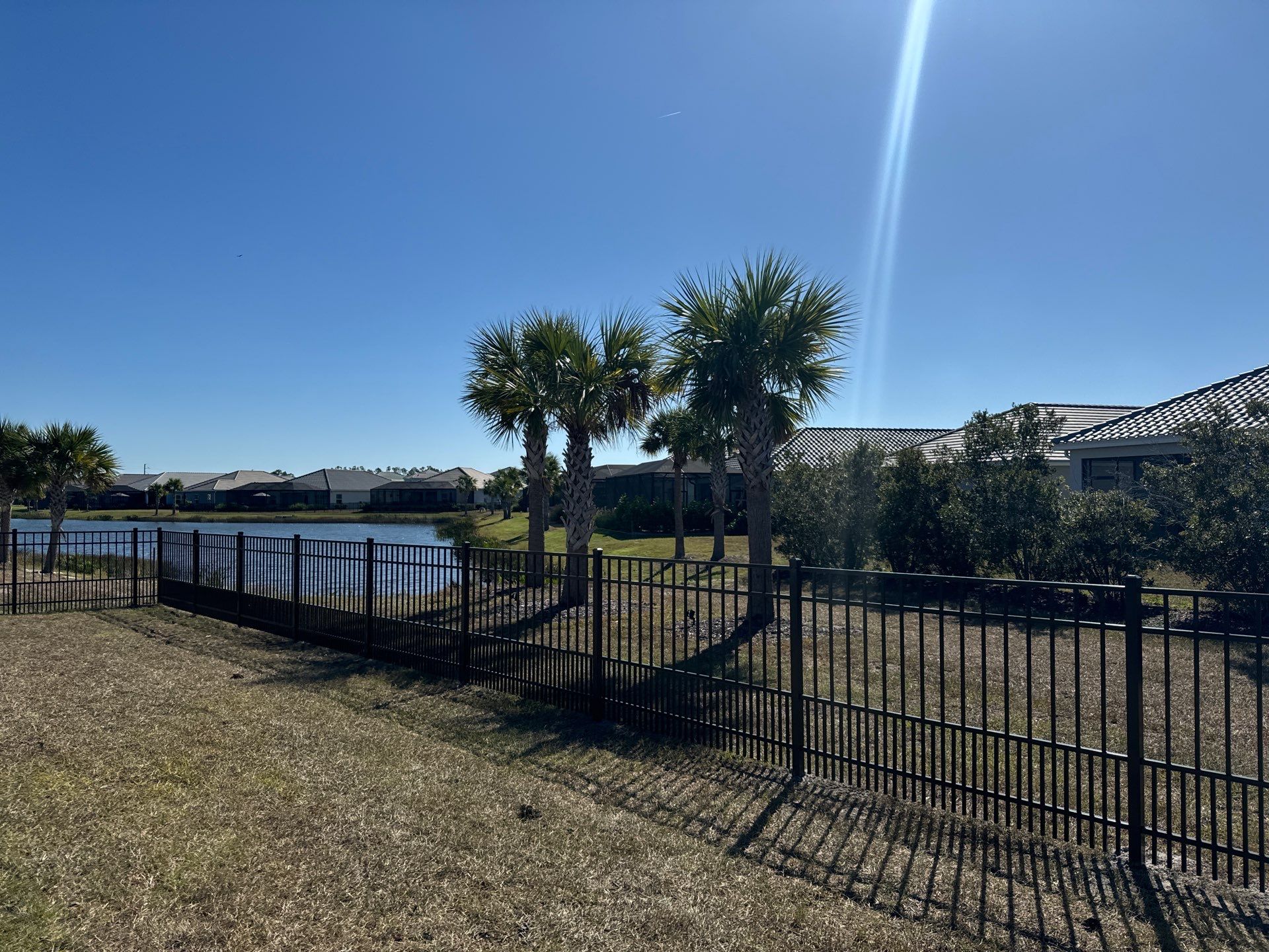 Aluminum Fence Installation using 4Ft 3 Rail Bronze Puppy Picket Aluminum Fence by Asap fence and gates, LLC